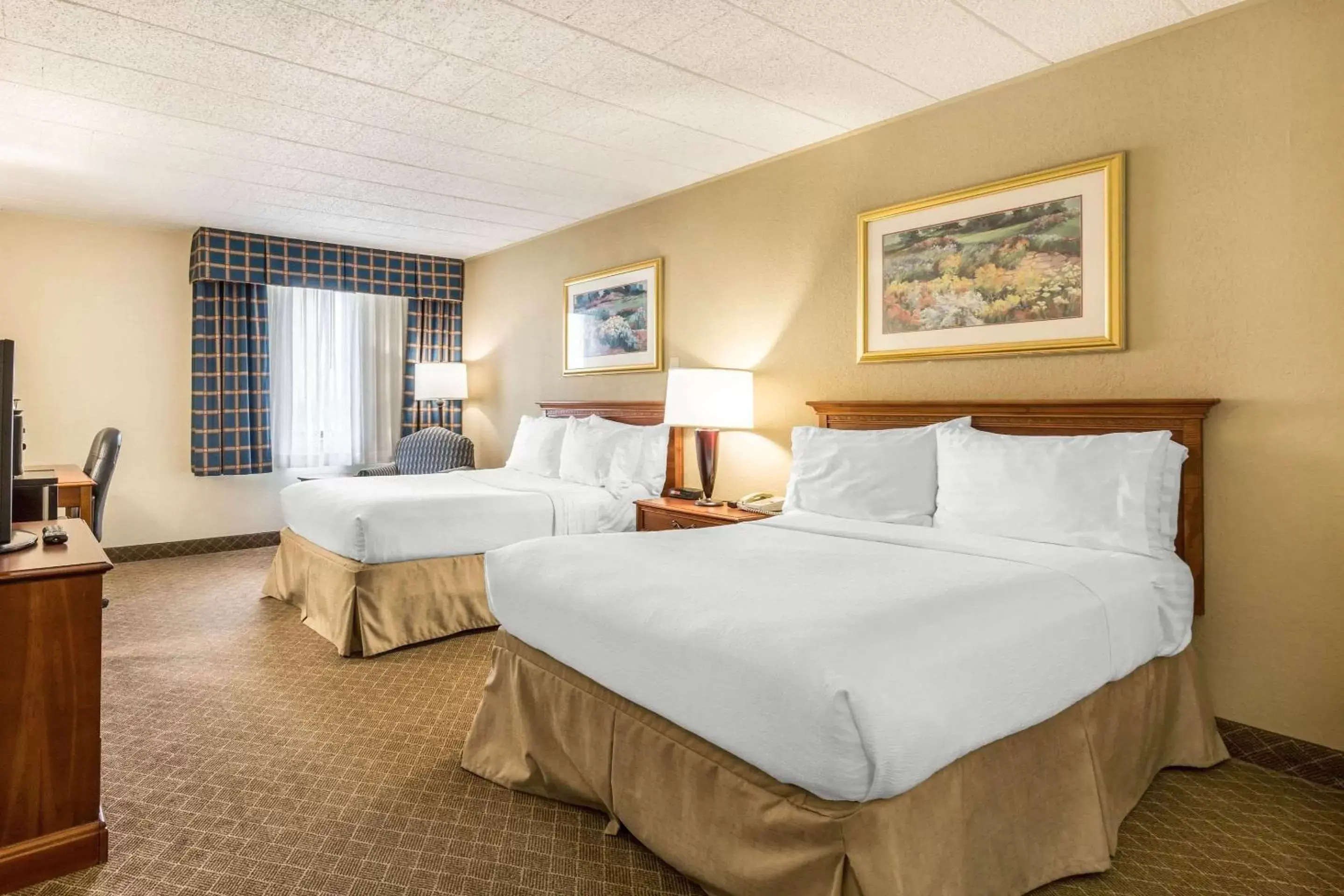 Photo of the whole room, Bed in Clarion Inn Frederick Event Center