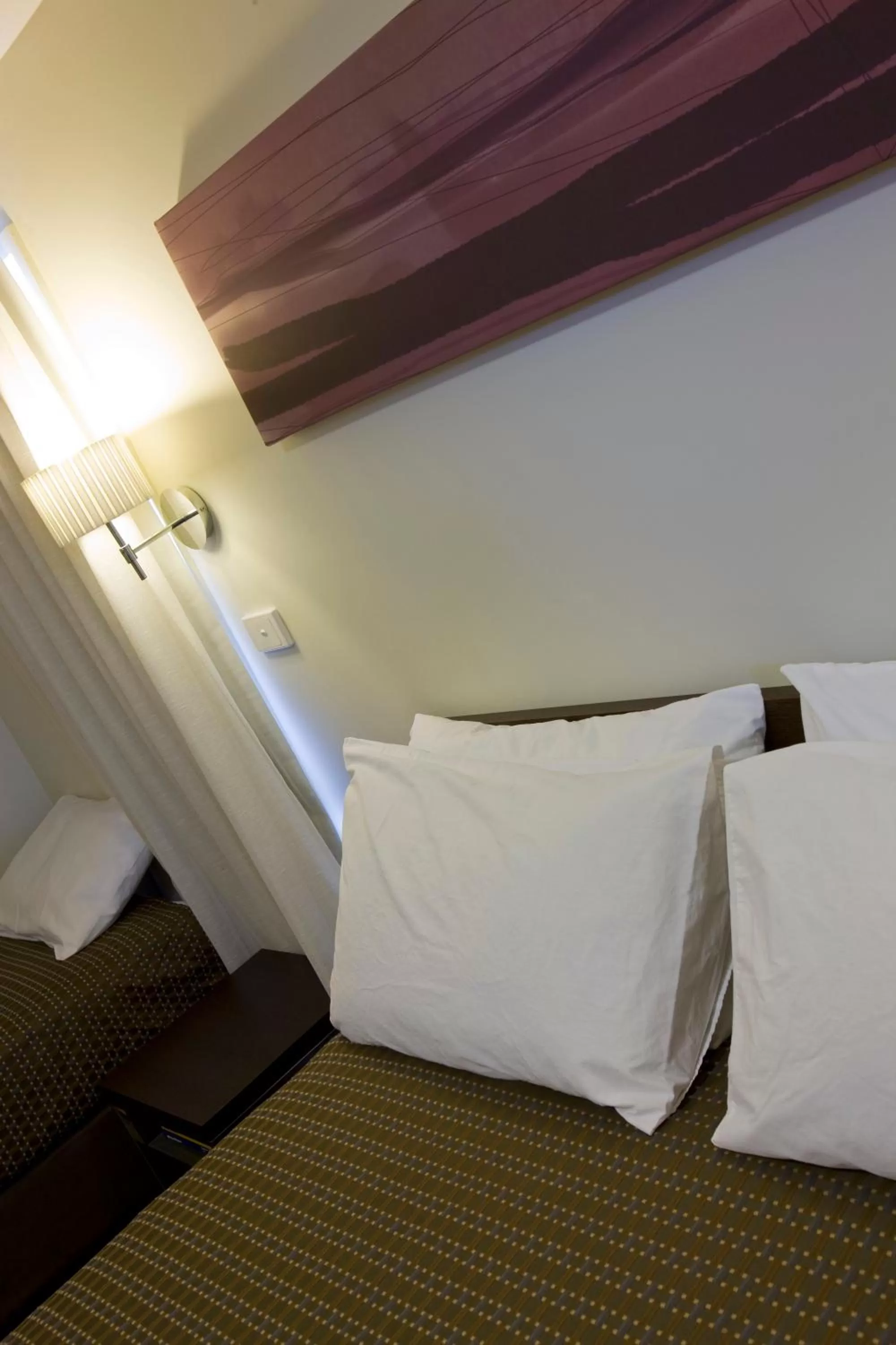 Decorative detail, Bed in ibis Styles Canberra Tall Trees