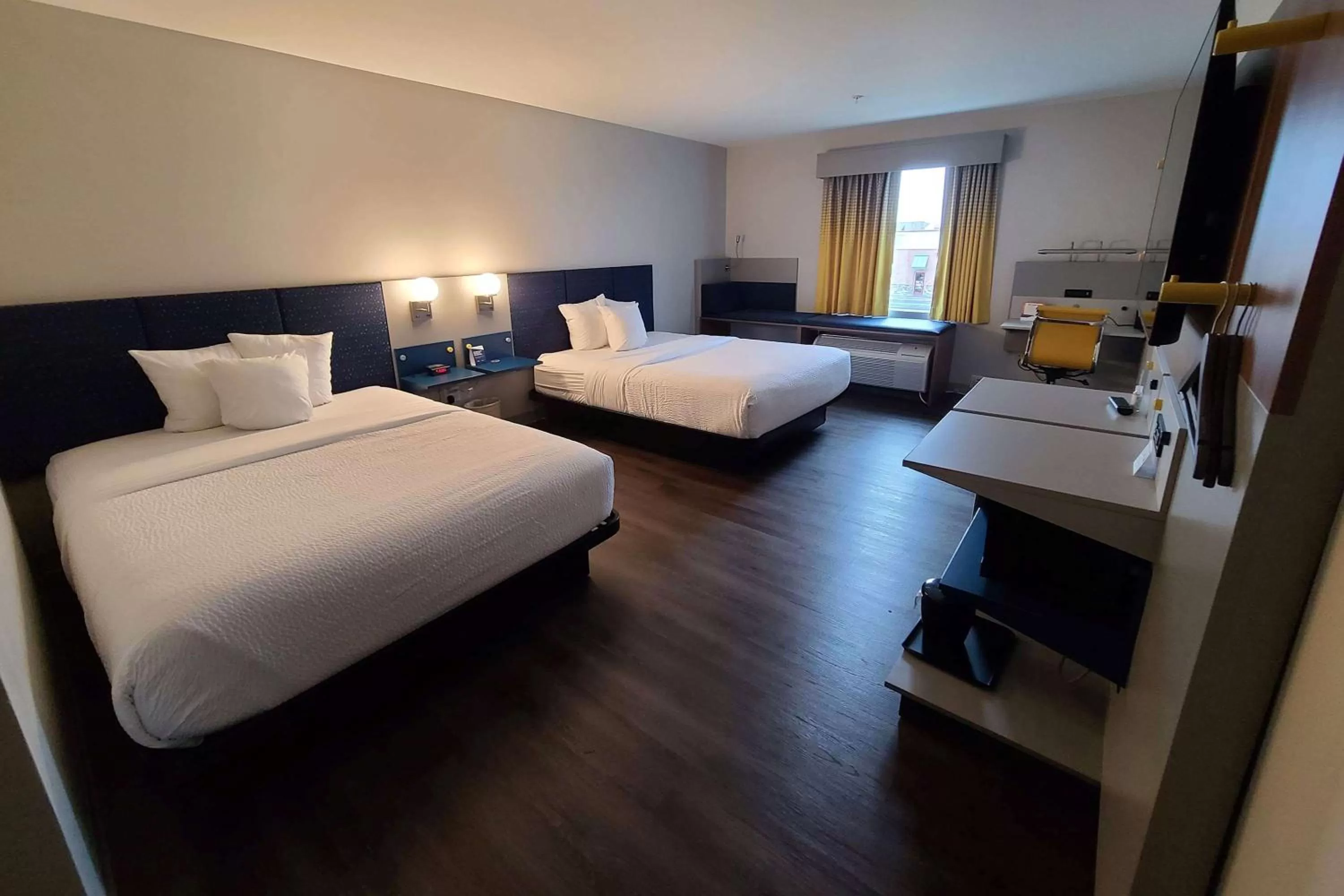Photo of the whole room, Bed in Microtel Inn & Suites by Wyndham Milford