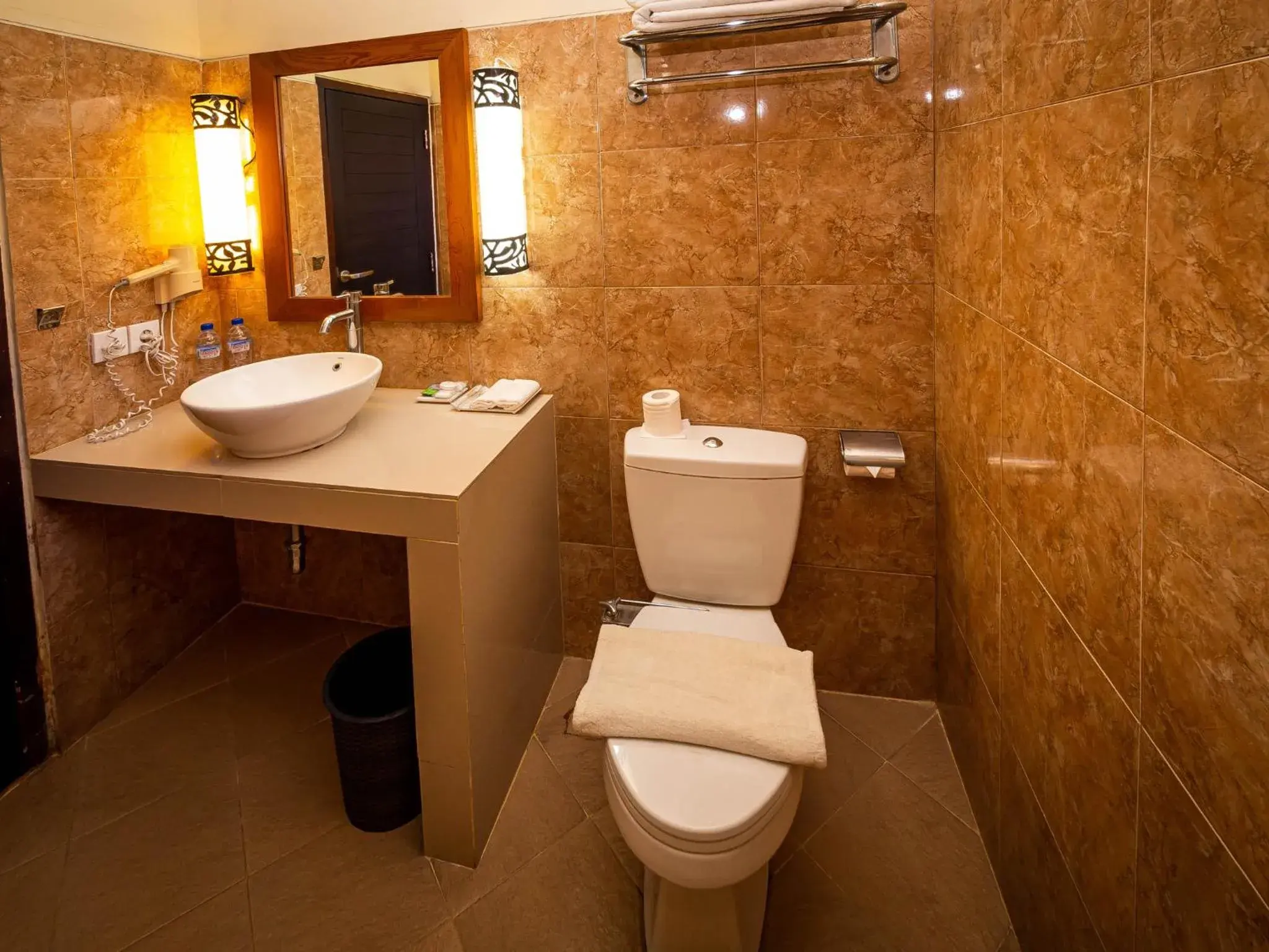 Bathroom in Yulia Beach Inn Kuta