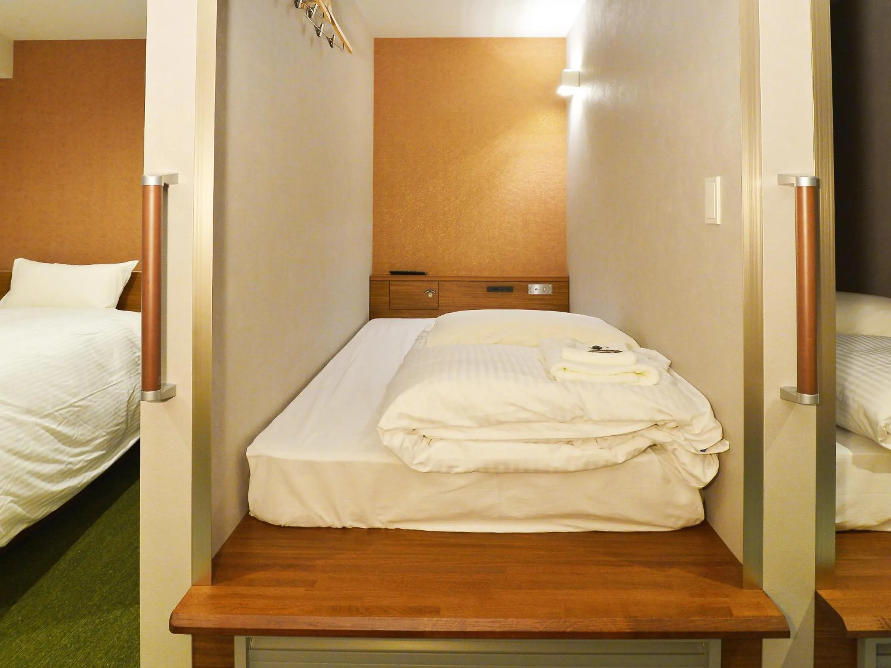 Bed in Gardens Cabin