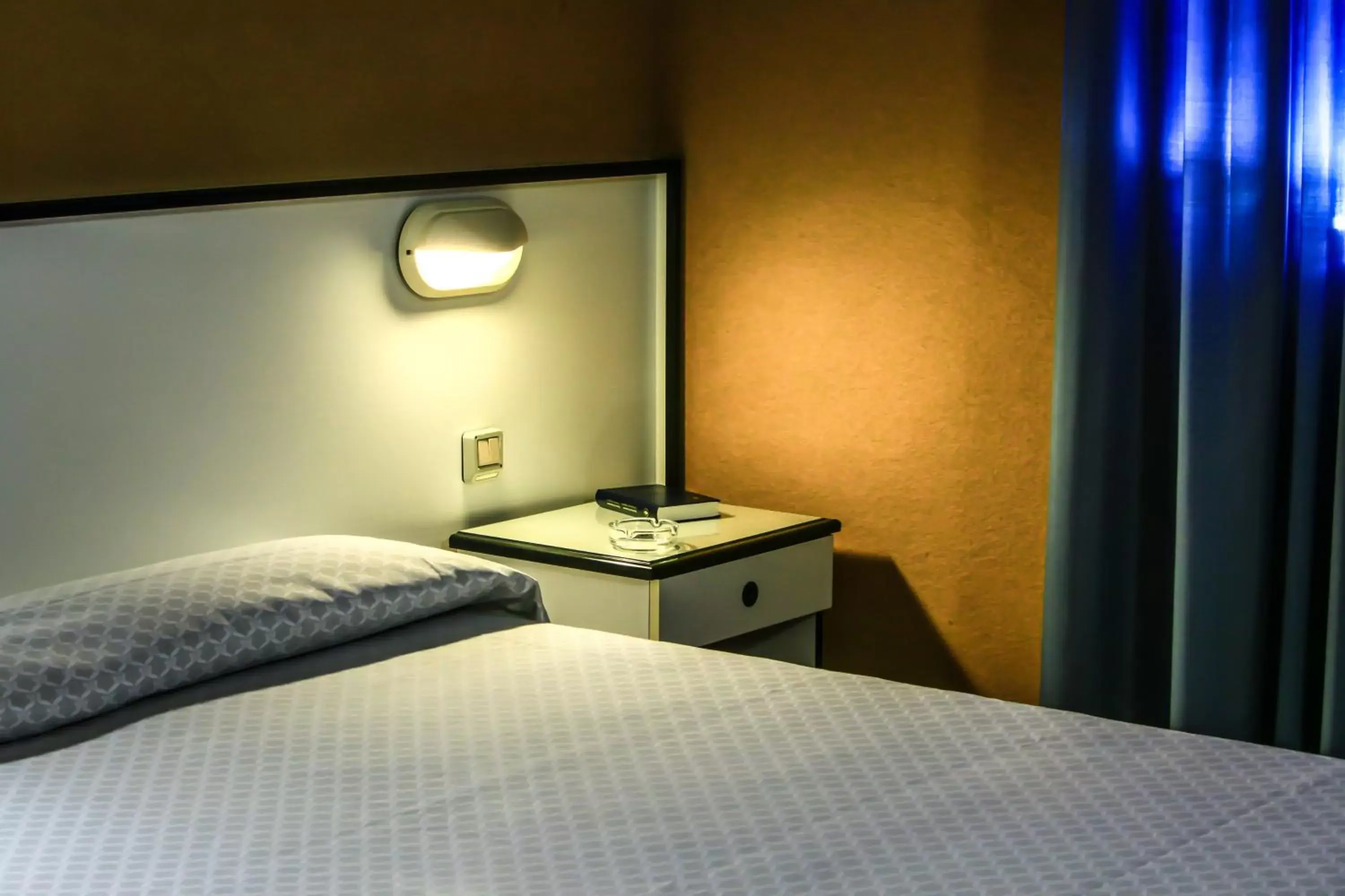 Bed in Hotel Quadrifoglio
