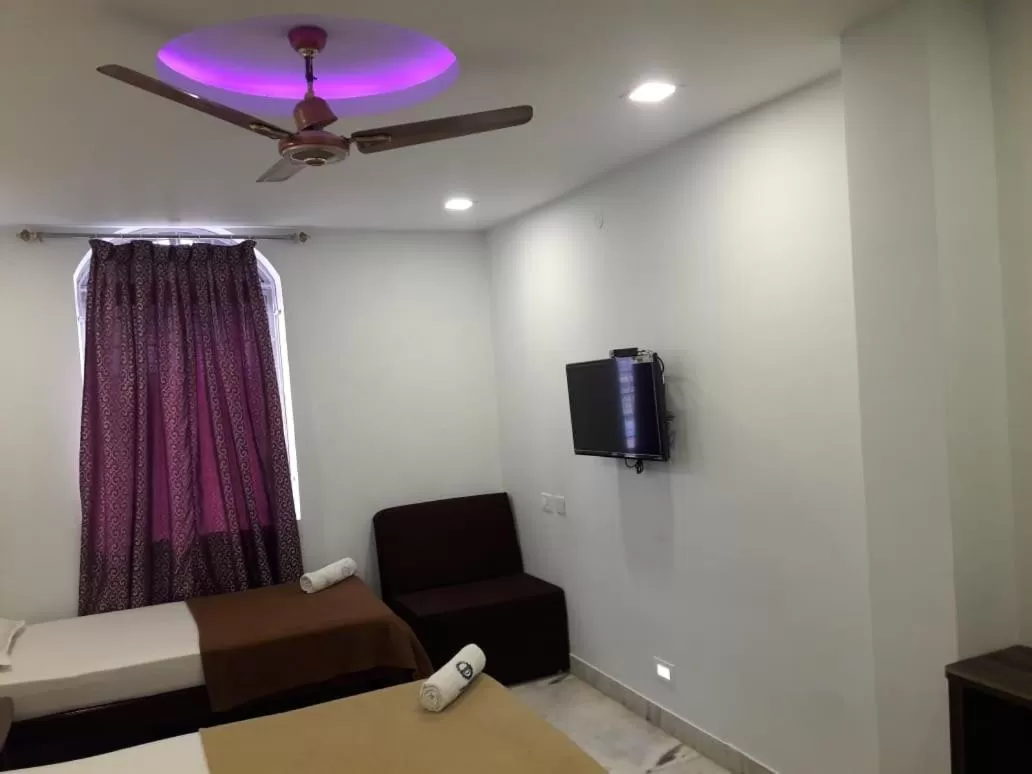 Seating area, TV/Entertainment Center in Hotel Ramco Residency A/c
