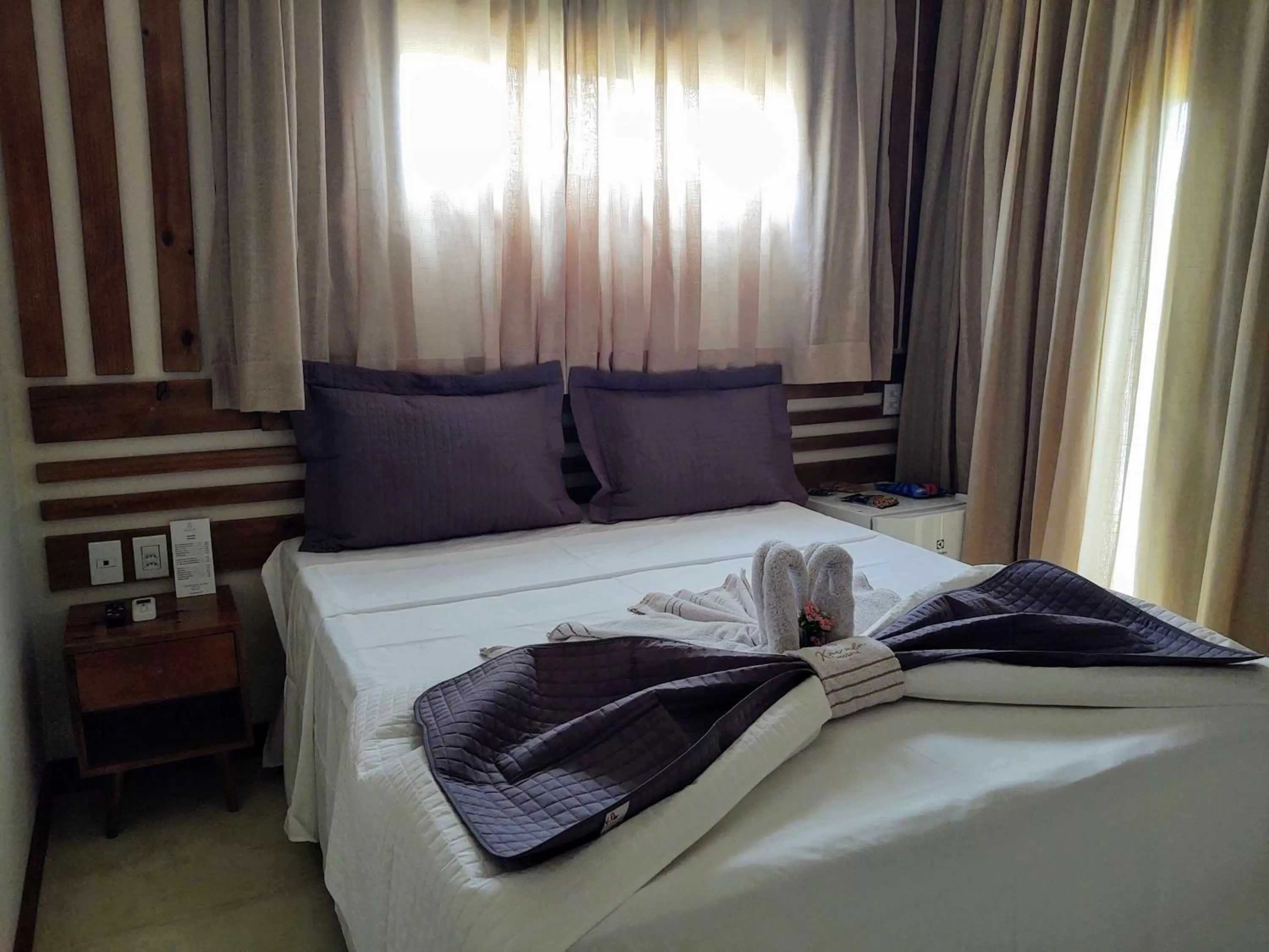 Bed in Kai'ala Pousada