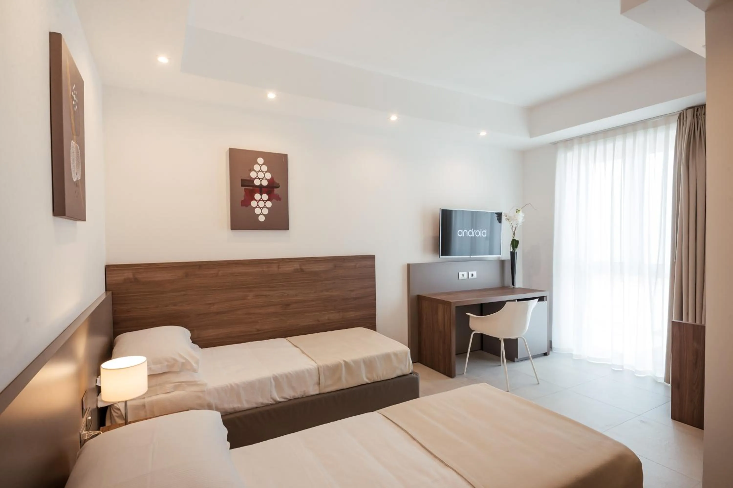 Bed in Grieco Business & Spa Hotel