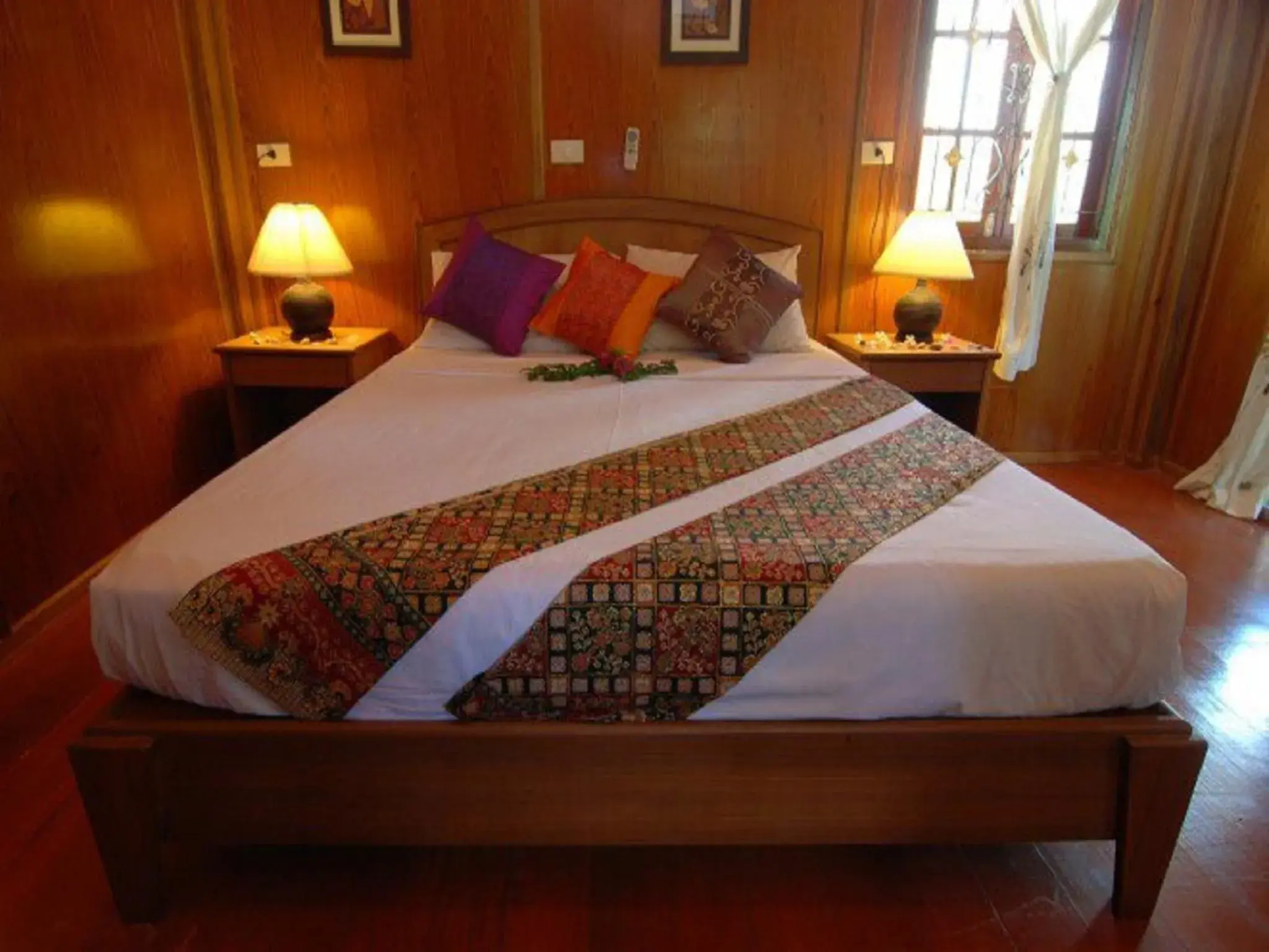 Bed in Sayang Beach Resort Koh Lanta