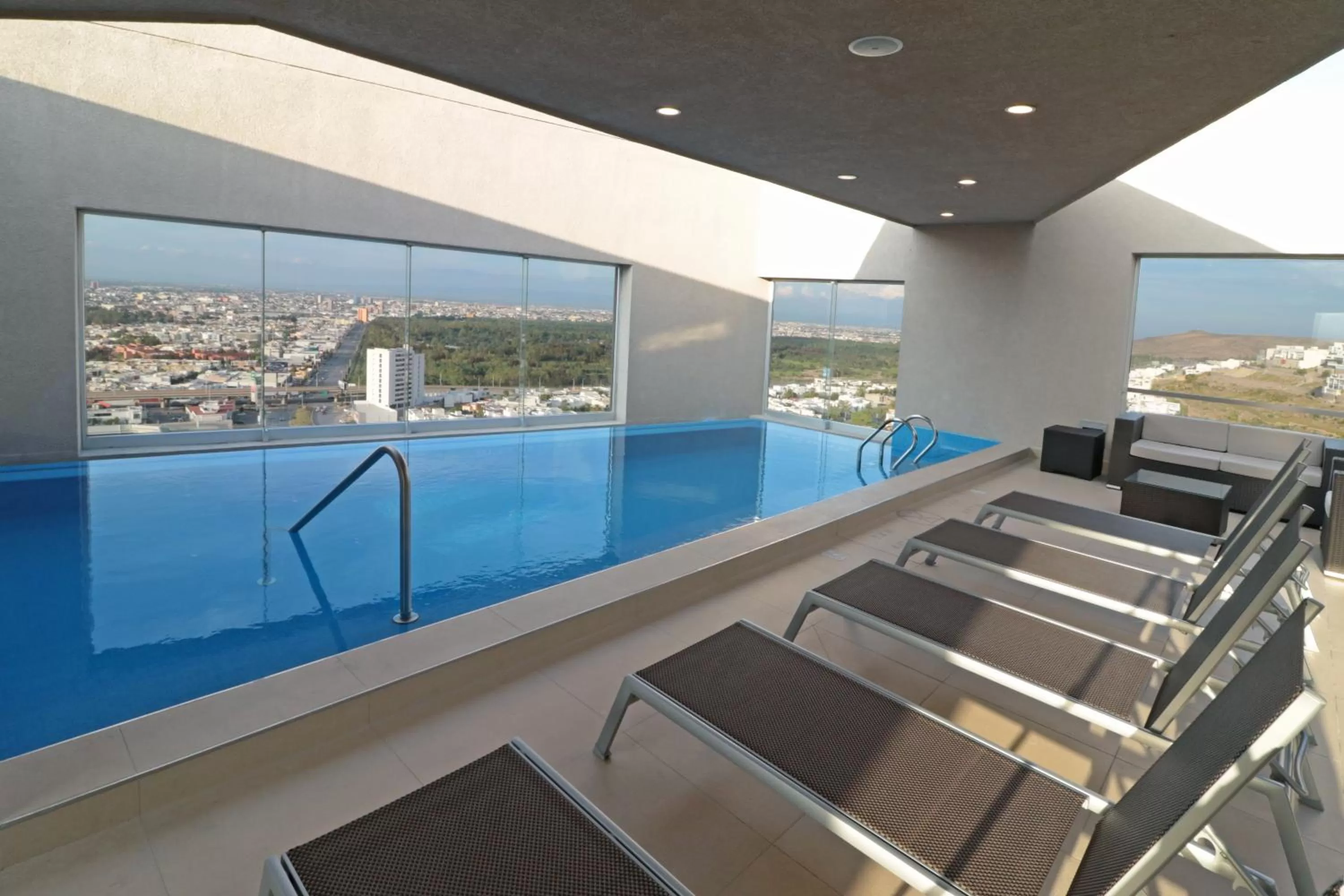 Swimming pool in Staybridge Suites San Luis Potosi by IHG