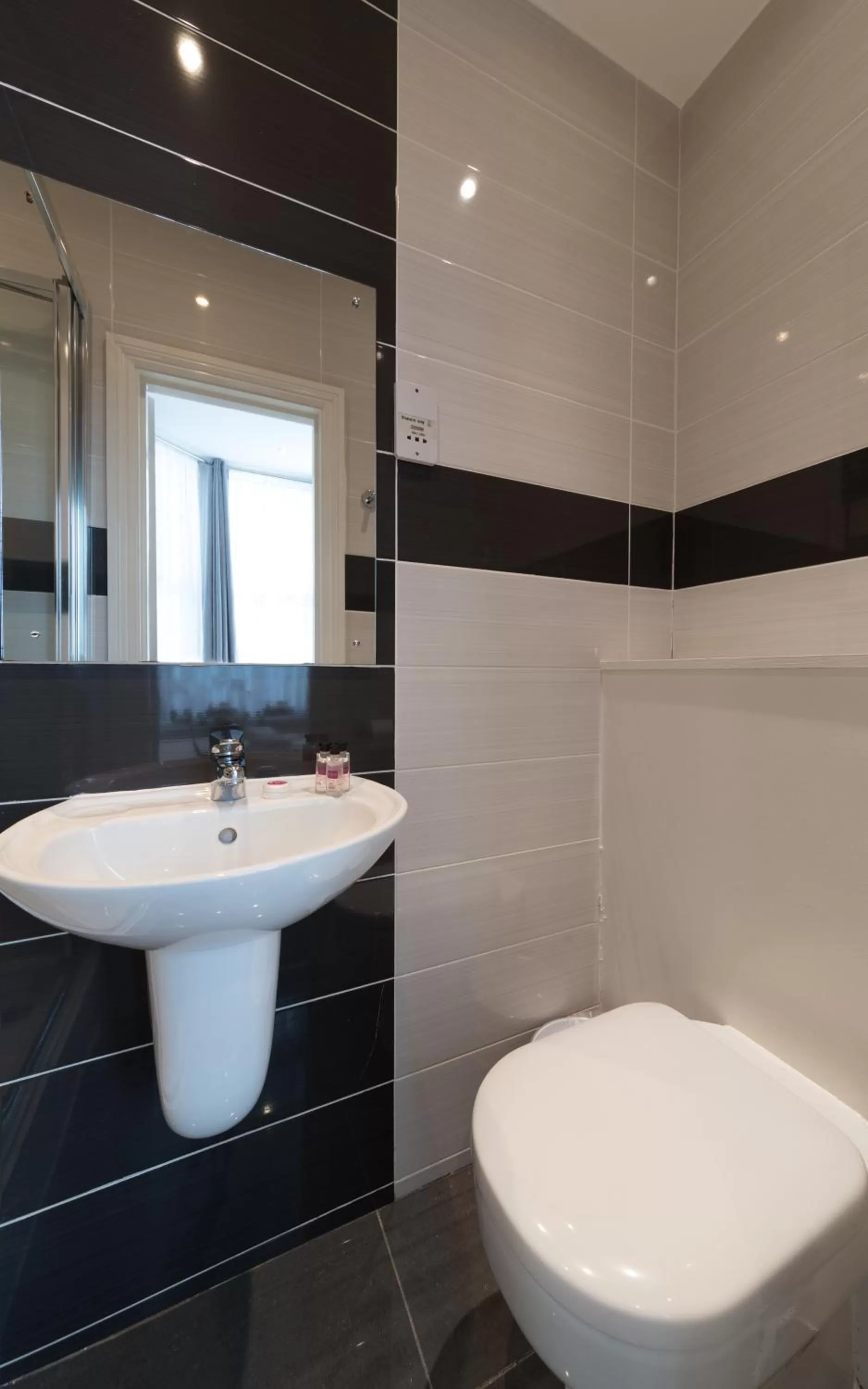 Bathroom in Royal London Hotel By Saba