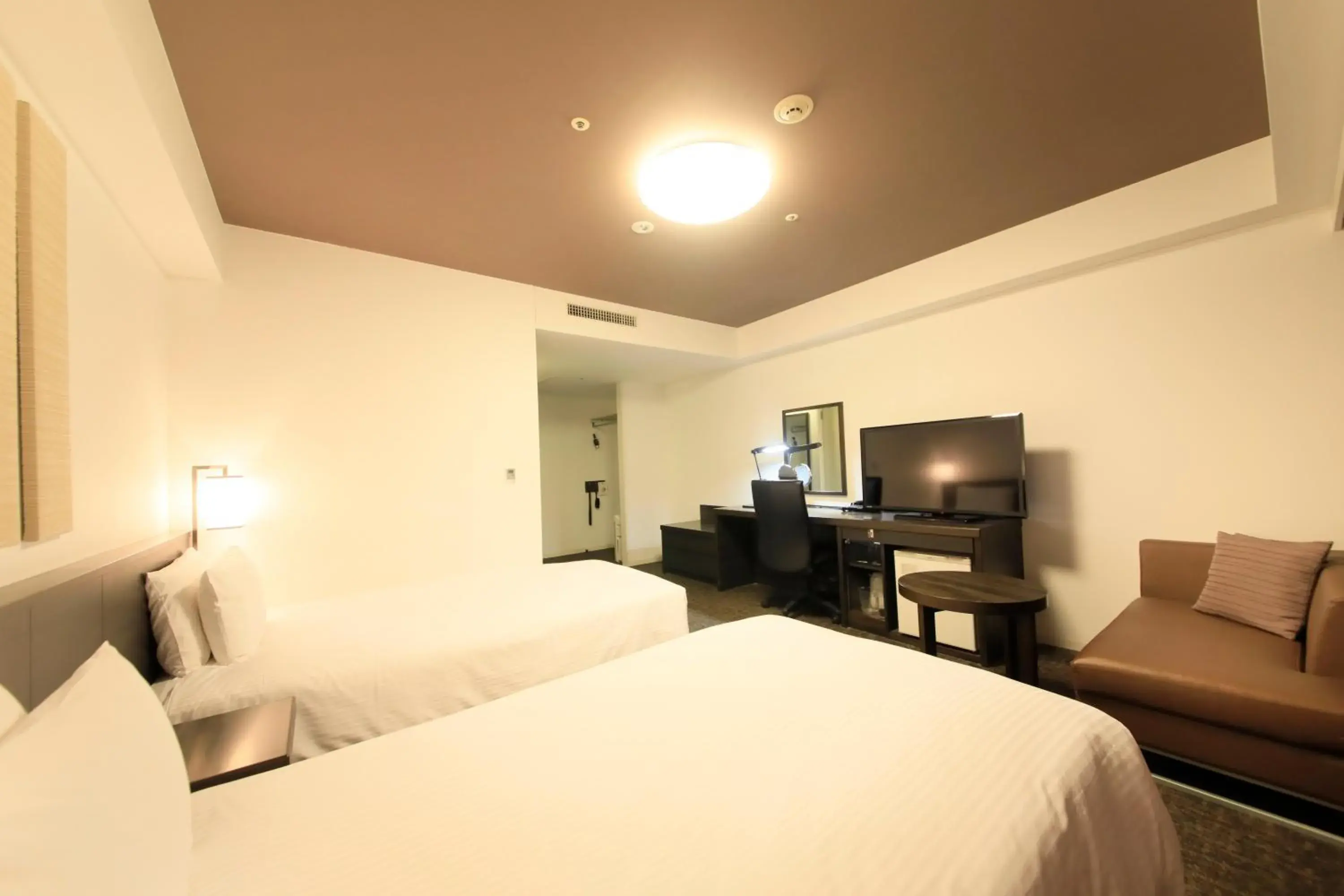 Bed in Daiwa Roynet Hotel Yokohama-Koen