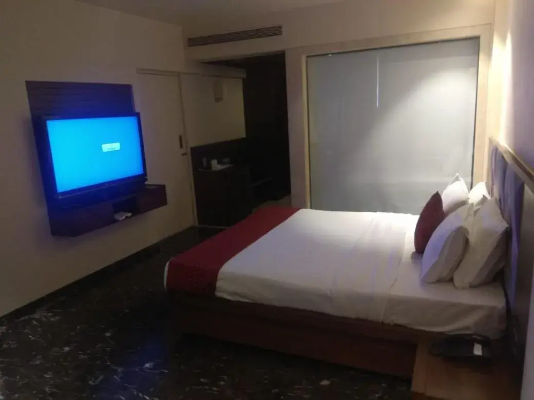 Bed in Quality Inn Regency, Nashik