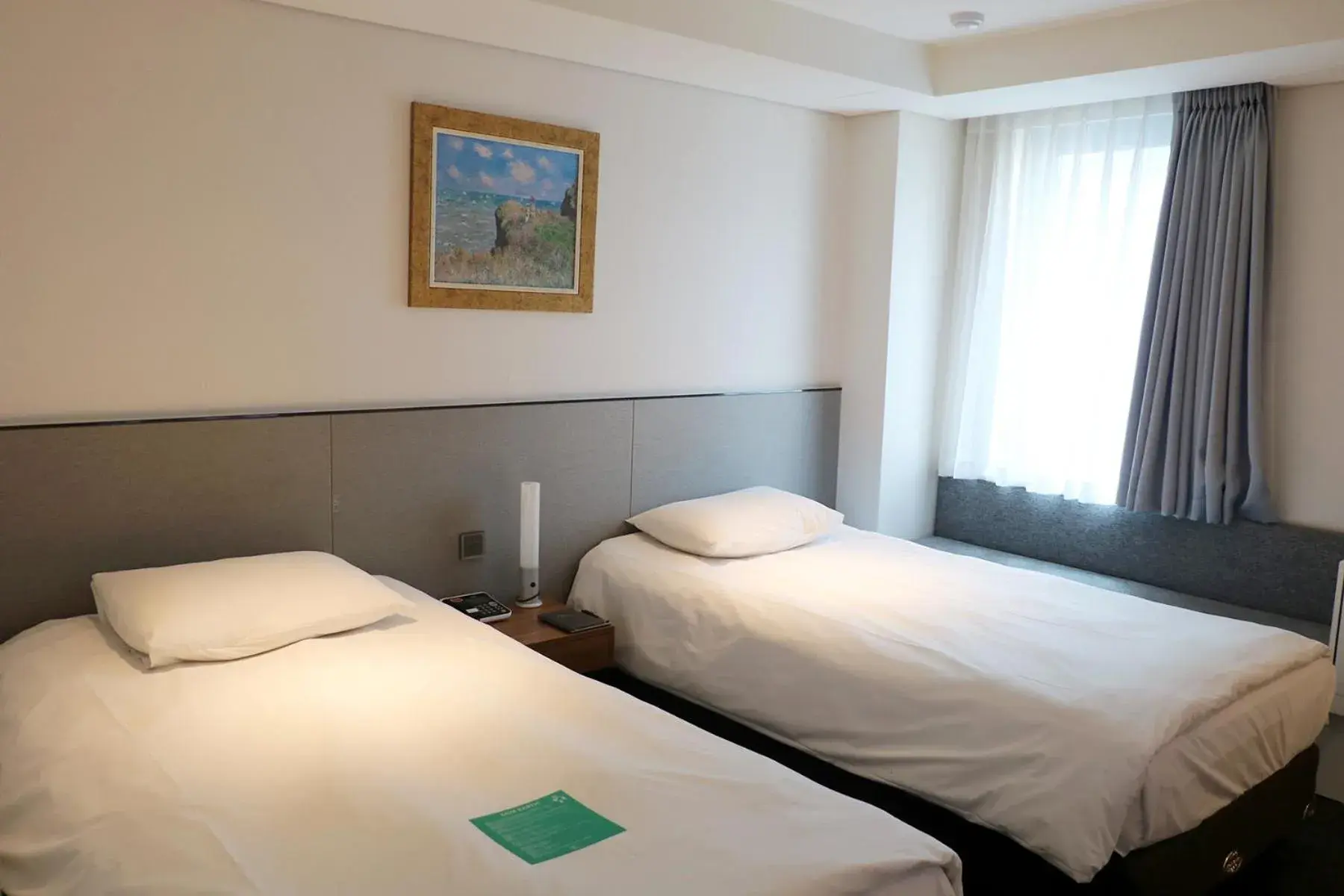 Bed in Hotel Thomas Myeongdong