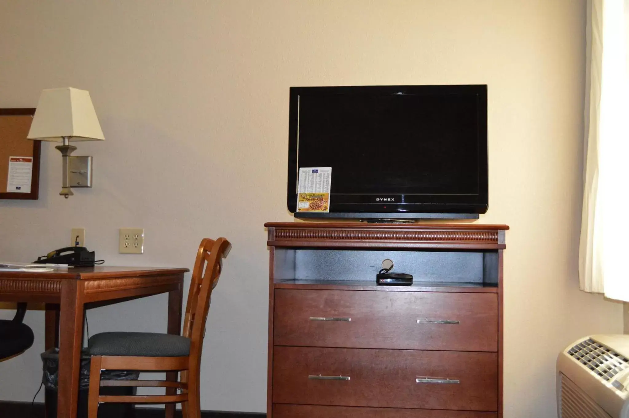 Photo of the whole room, TV/Entertainment Center in Candlewood Suites-Augusta, an IHG Hotel