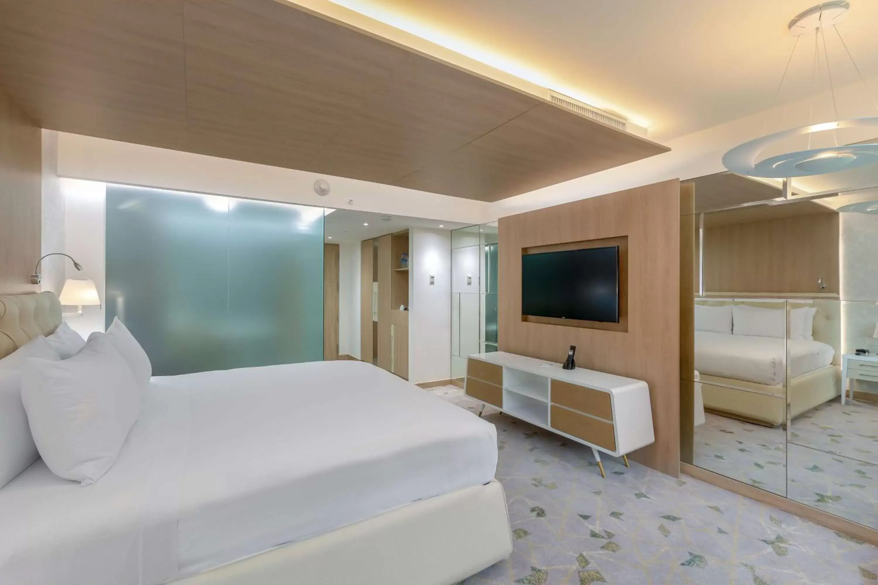 Bed, TV/Entertainment Center in Gran Hotel Costa Rica, Curio Collection By Hilton