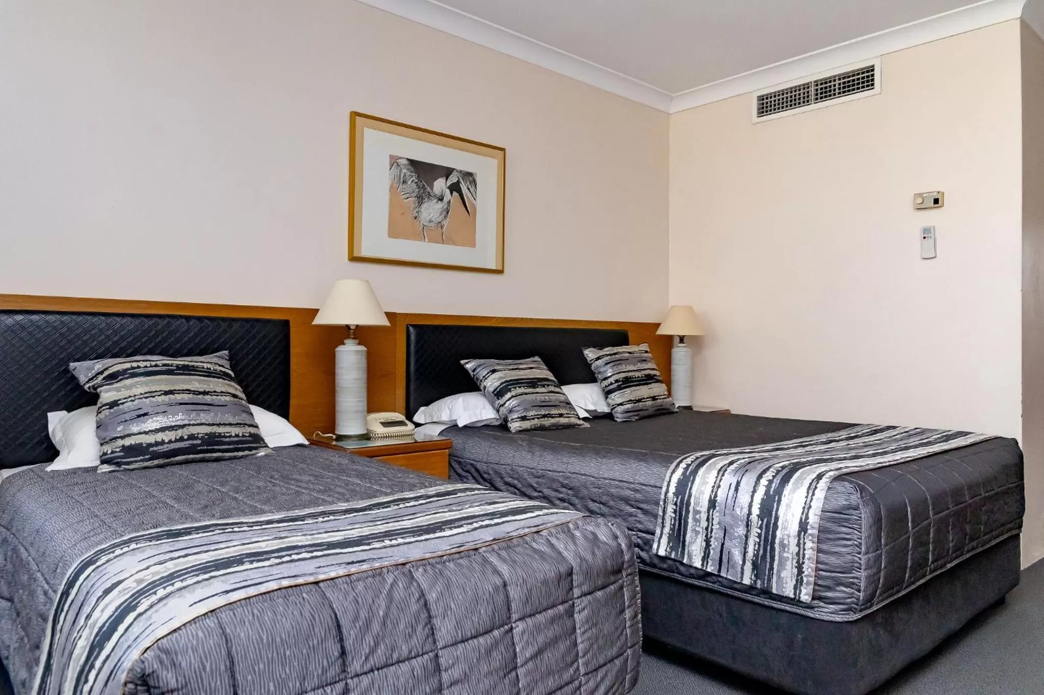 Photo of the whole room, Bed in Charbonnier Motor Inn