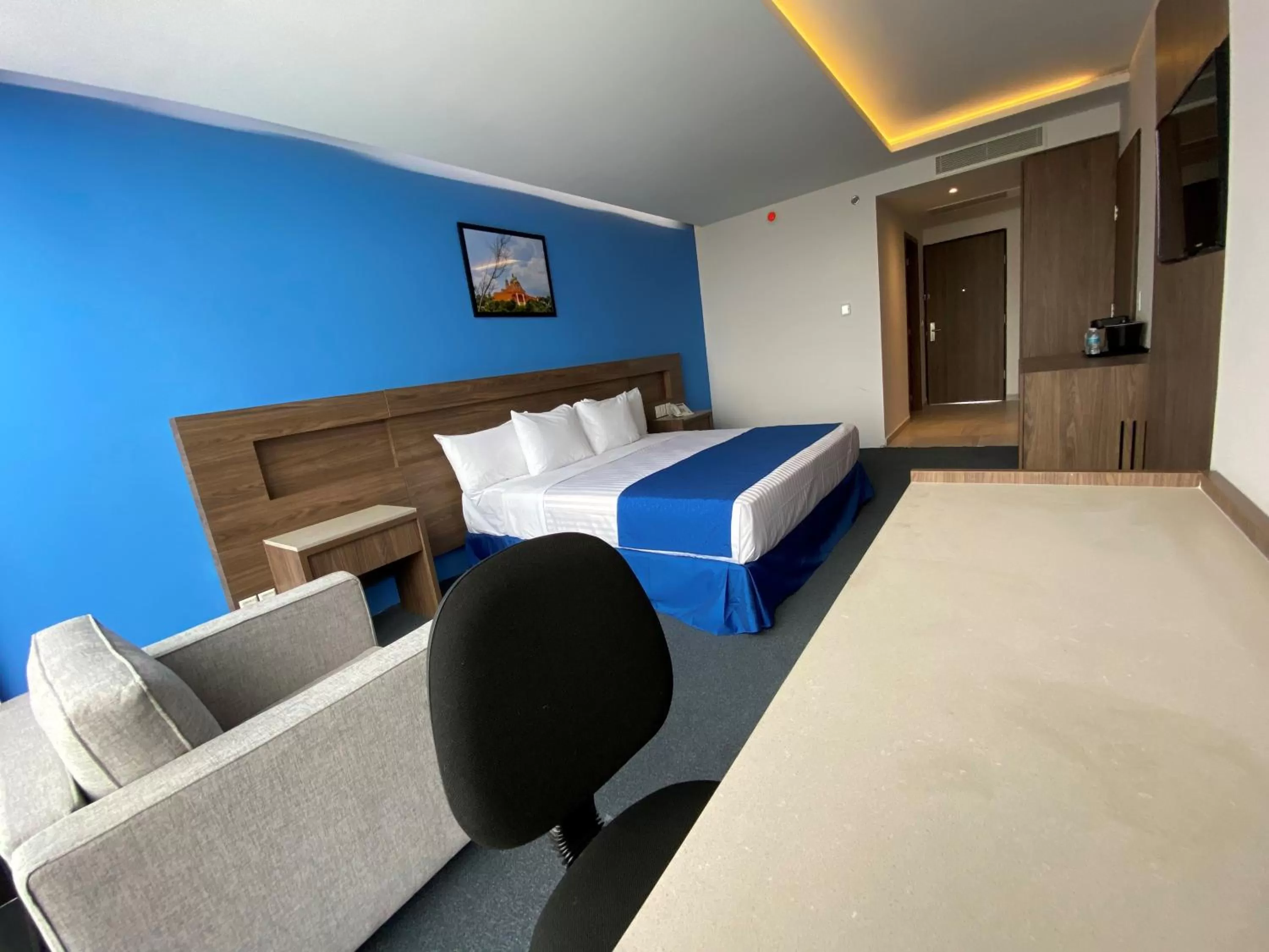 Photo of the whole room, Bed in Wyndham Puebla Angelopolis