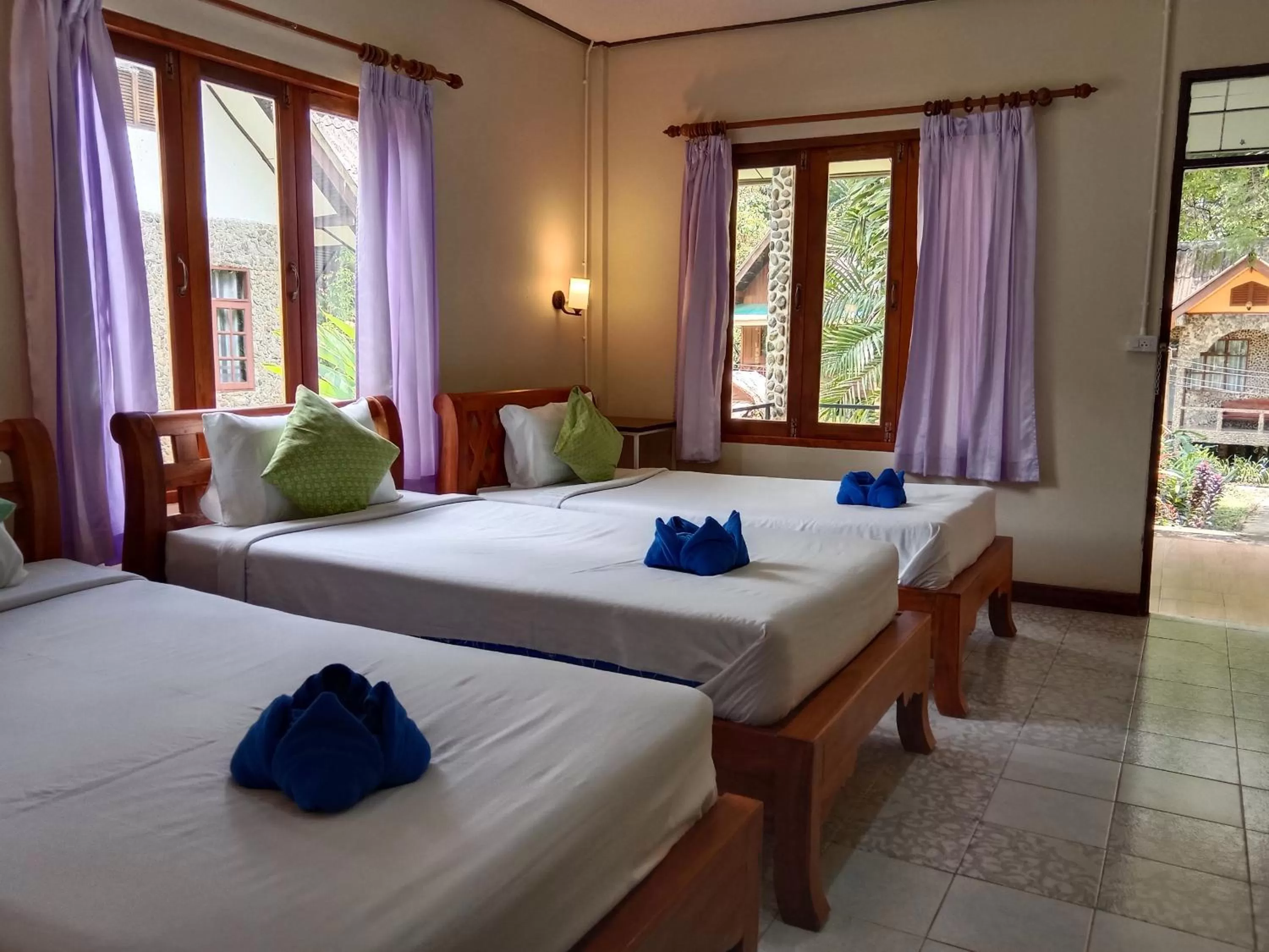 Bed in Tree Tops River Huts