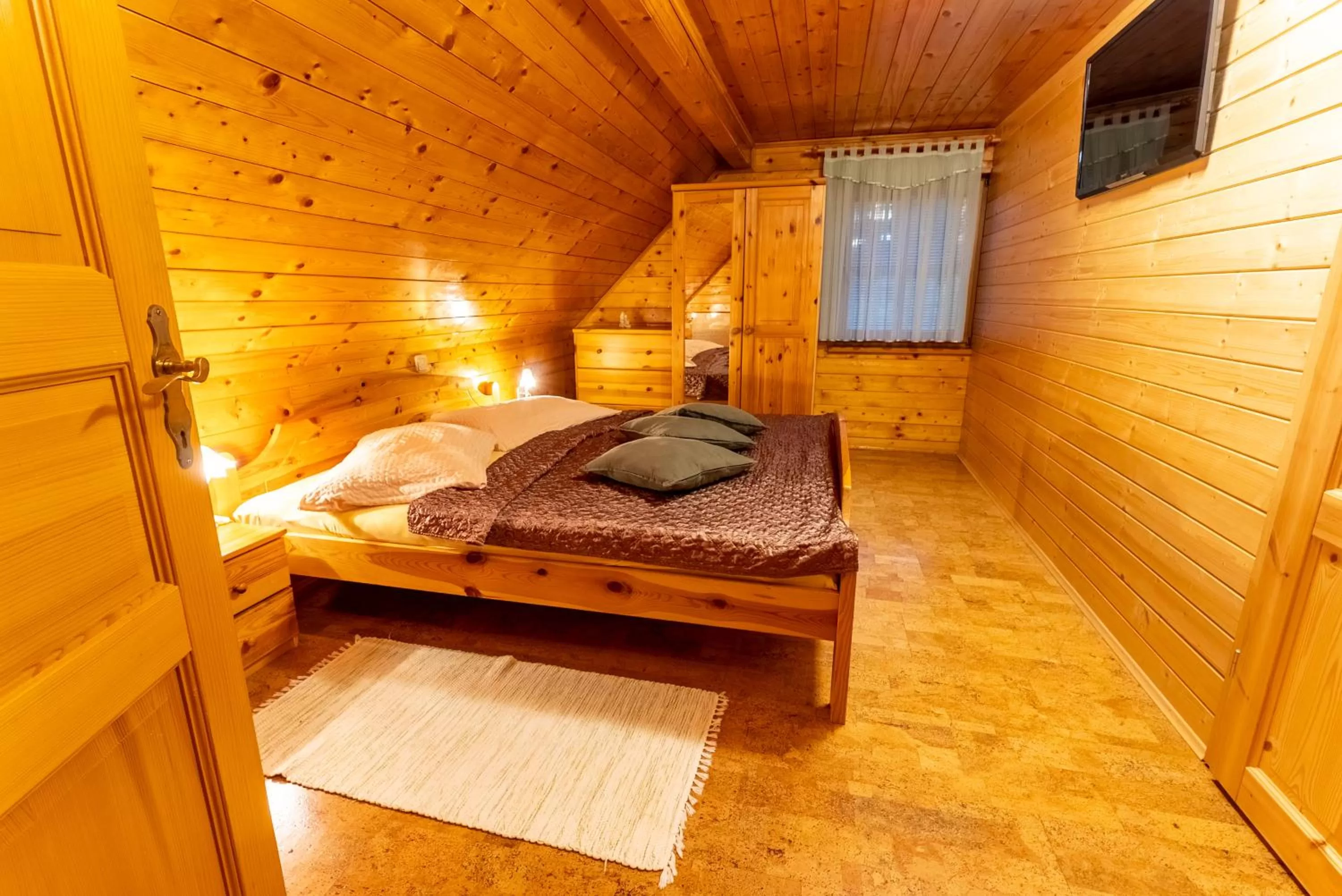 Bed in Korošec Apartments and Wellness Centre