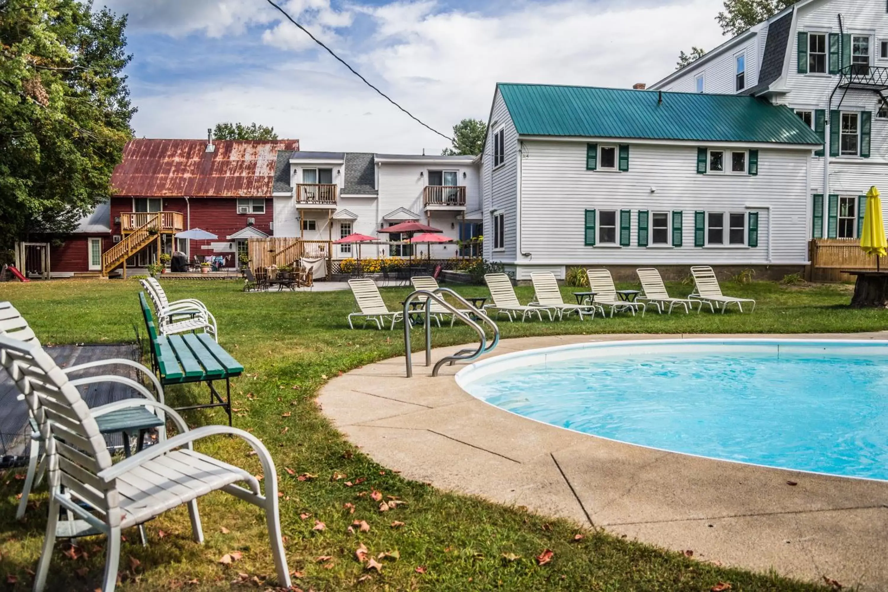 Swimming pool, Property Building in Cranmore Inn and Suites, a North Conway boutique hotel