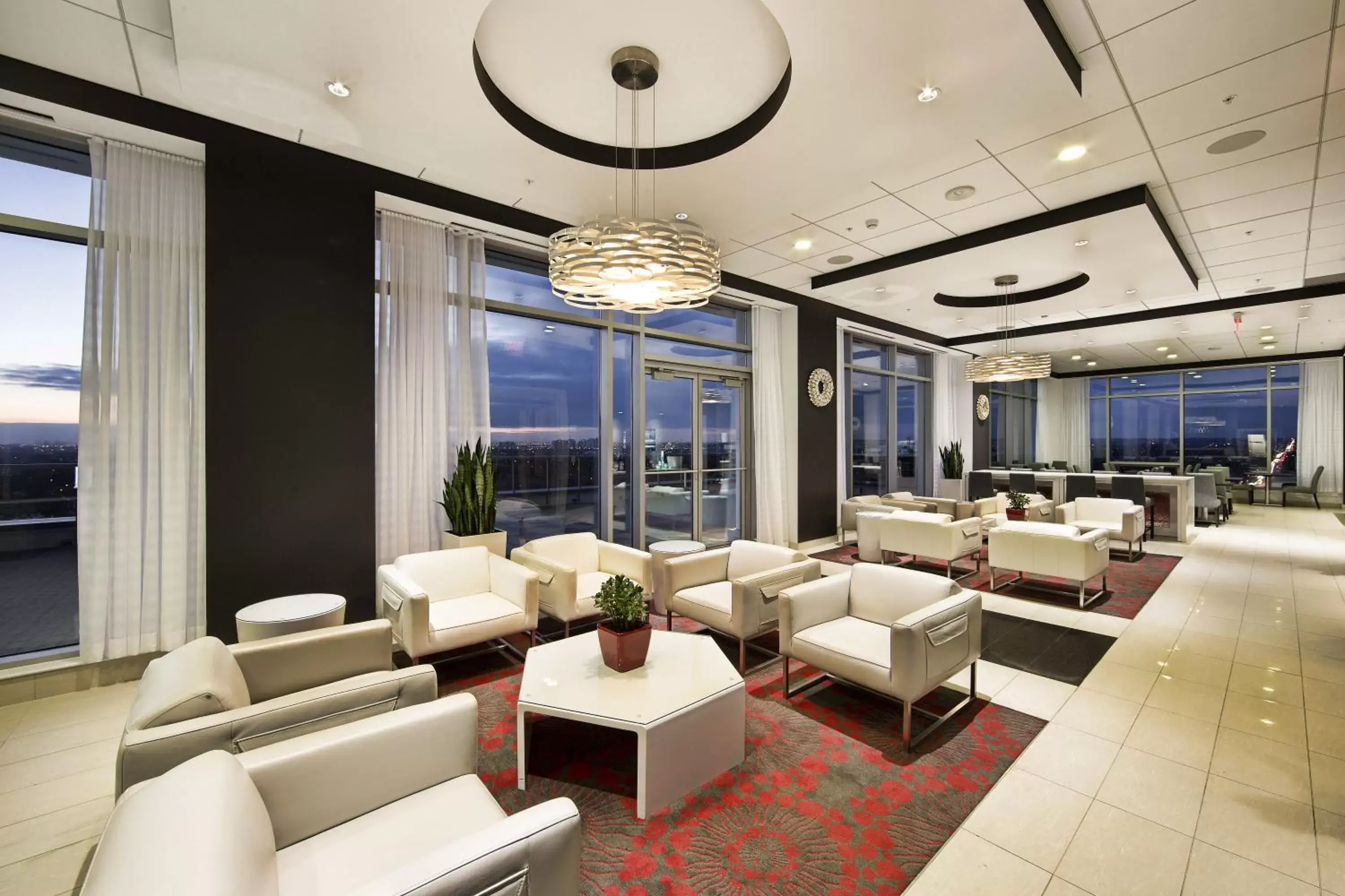 Lobby or reception, Lounge/Bar in Liberty Suites