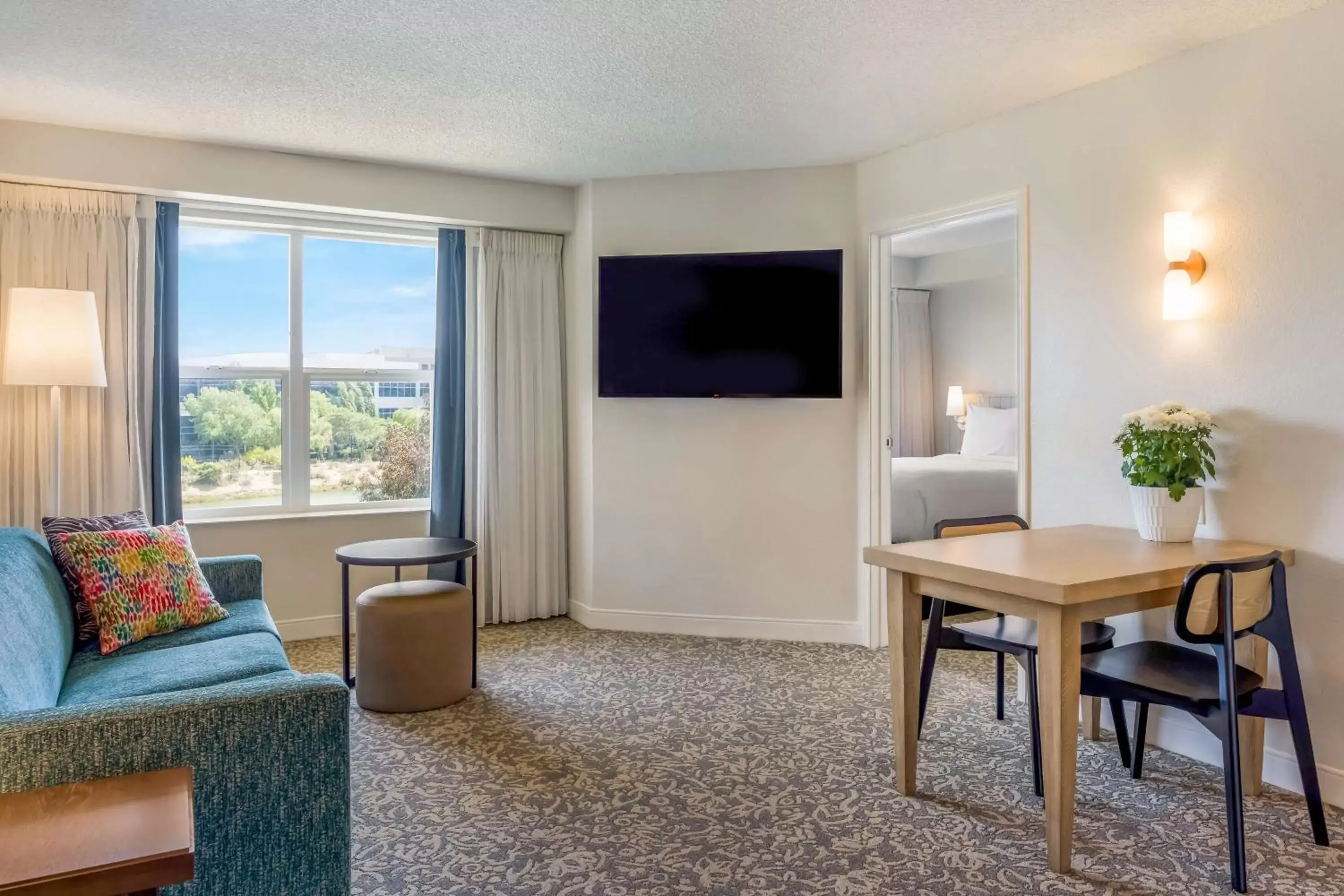 Photo of the whole room, TV/Entertainment Center in Sonesta ES Suites San Francisco Airport Oyster Point Waterfront
