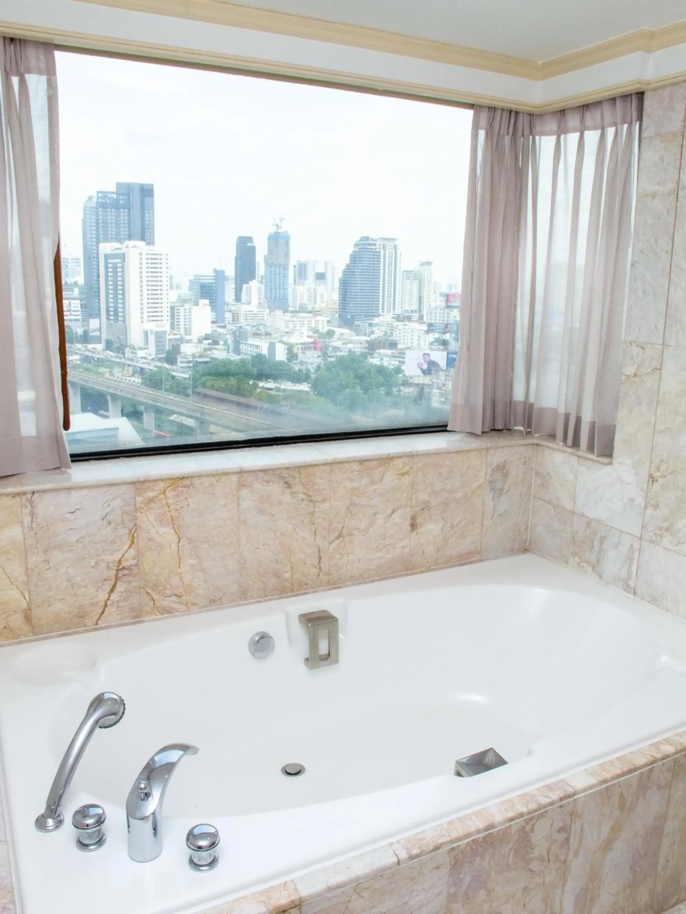 Bathroom in Ramada by Wyndham D MA Bangkok
