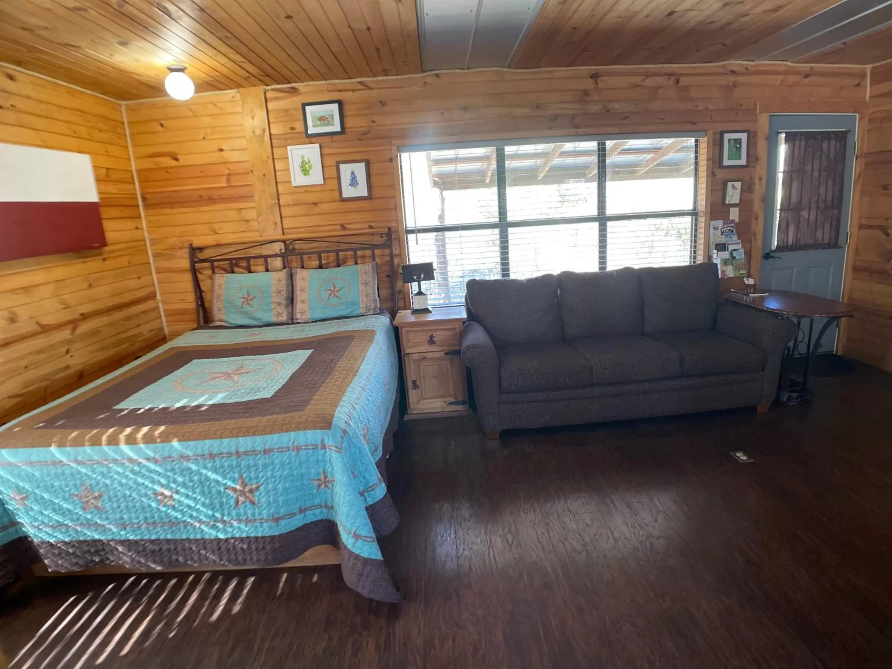 Bed, Seating Area in Walnut Canyon Cabins