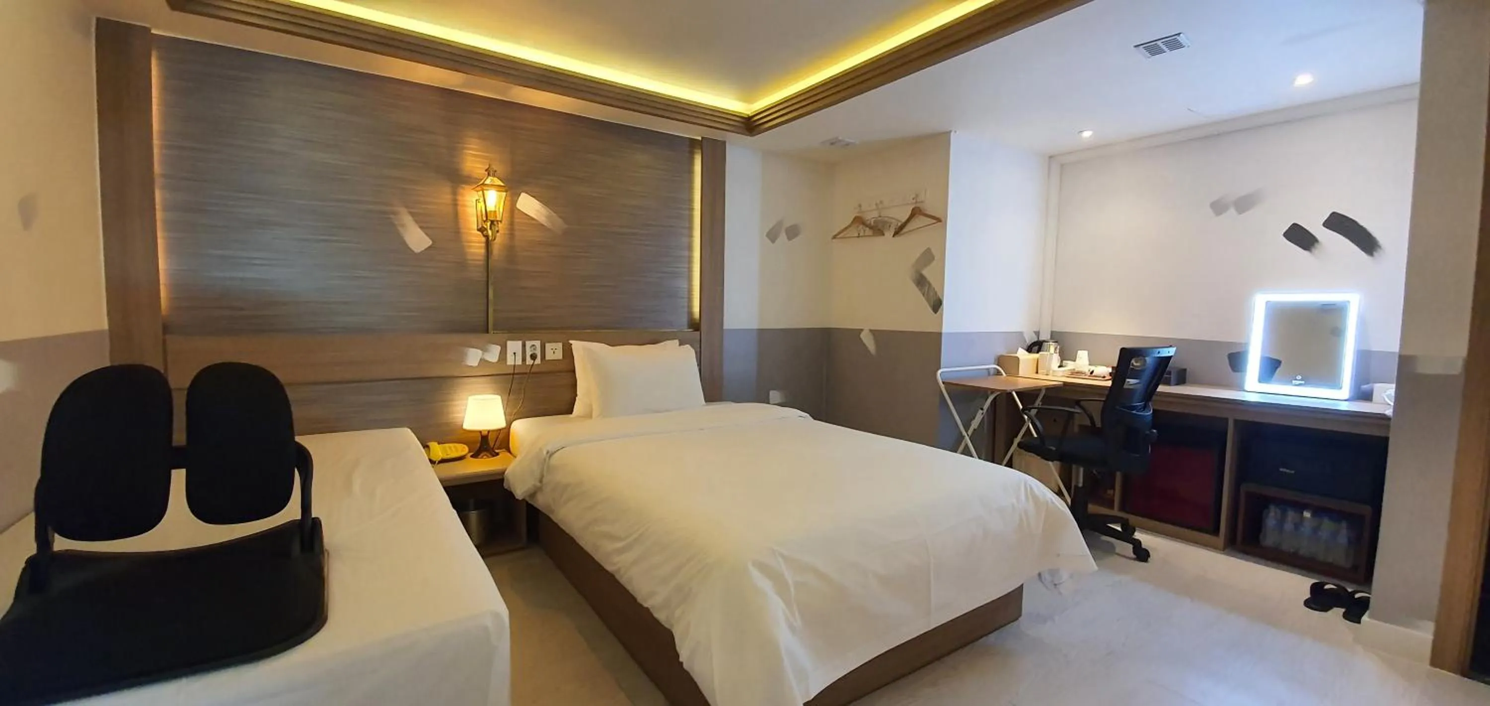 Bed in Friendly DH Naissance Hotel by Mindrum Group