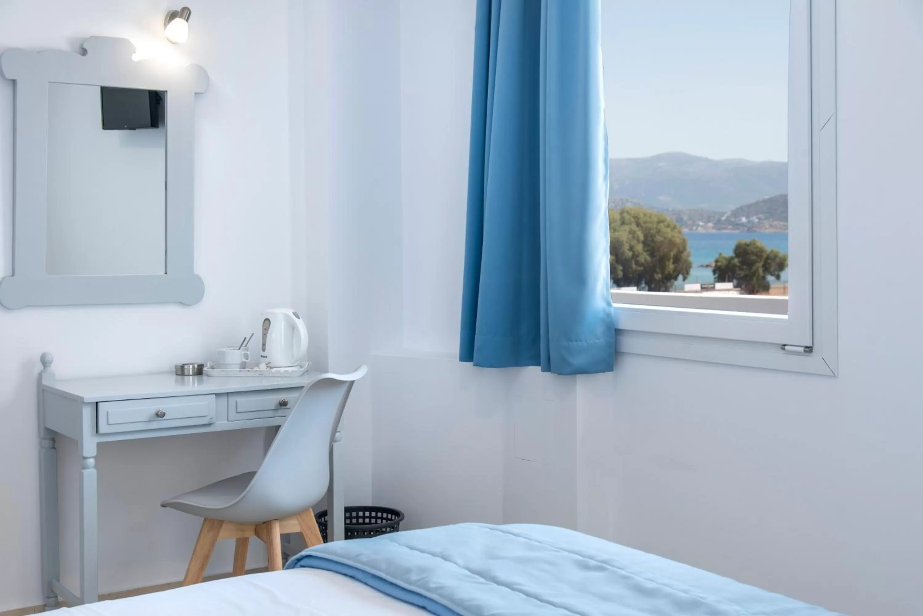 Bed in Naiades Marina Hotel