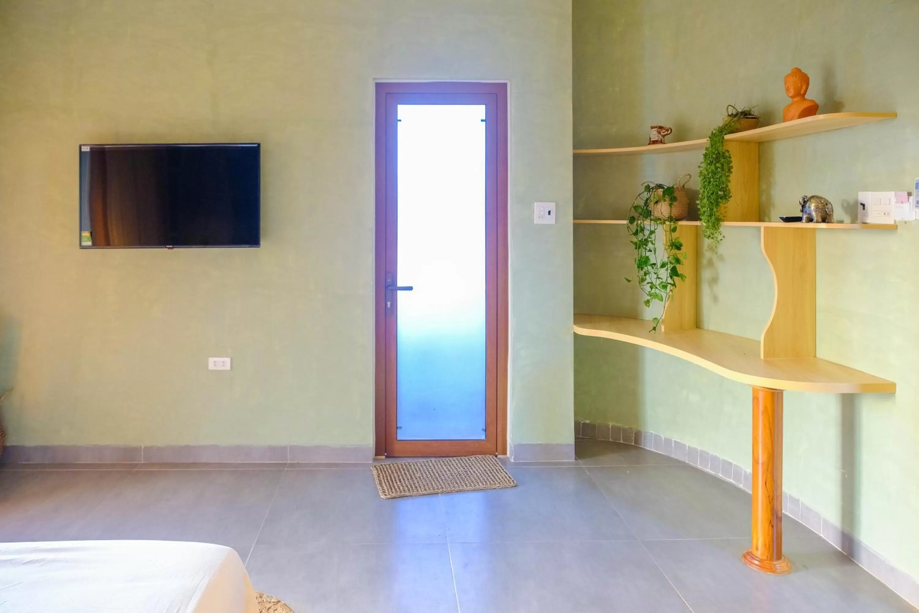 Photo of the whole room, TV/Entertainment Center in Eo Gió Có Homestay