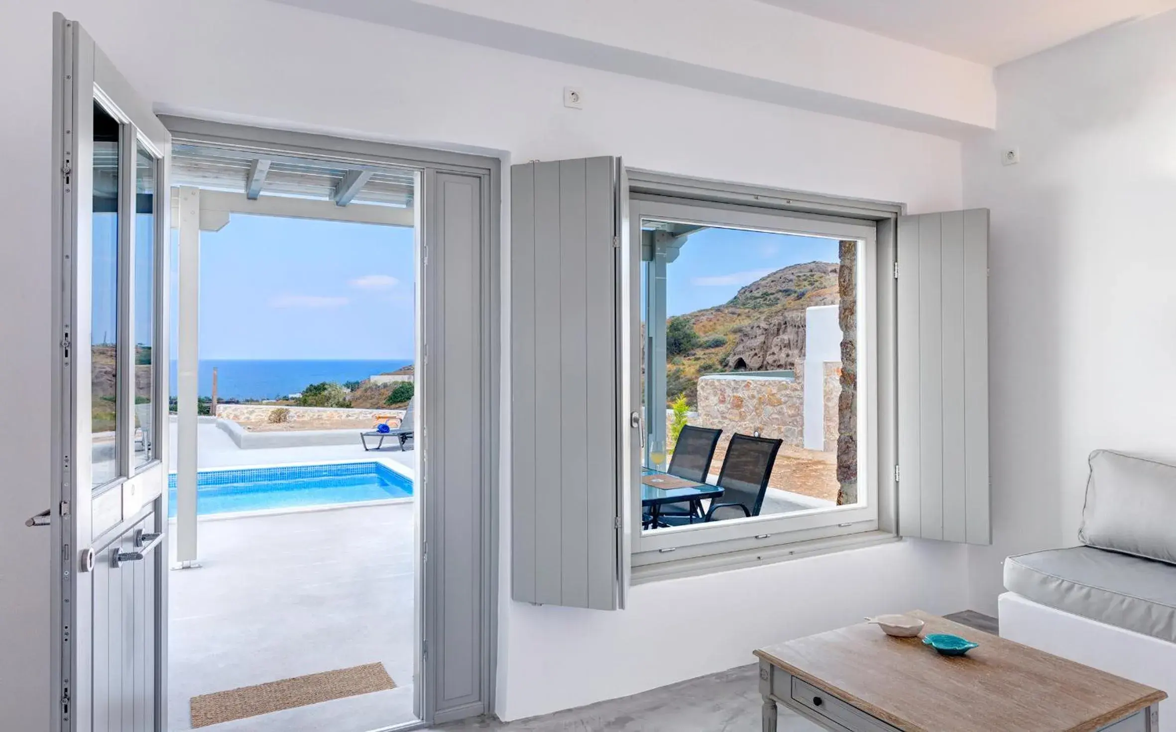 Living room, Pool View in Desiterra Resort