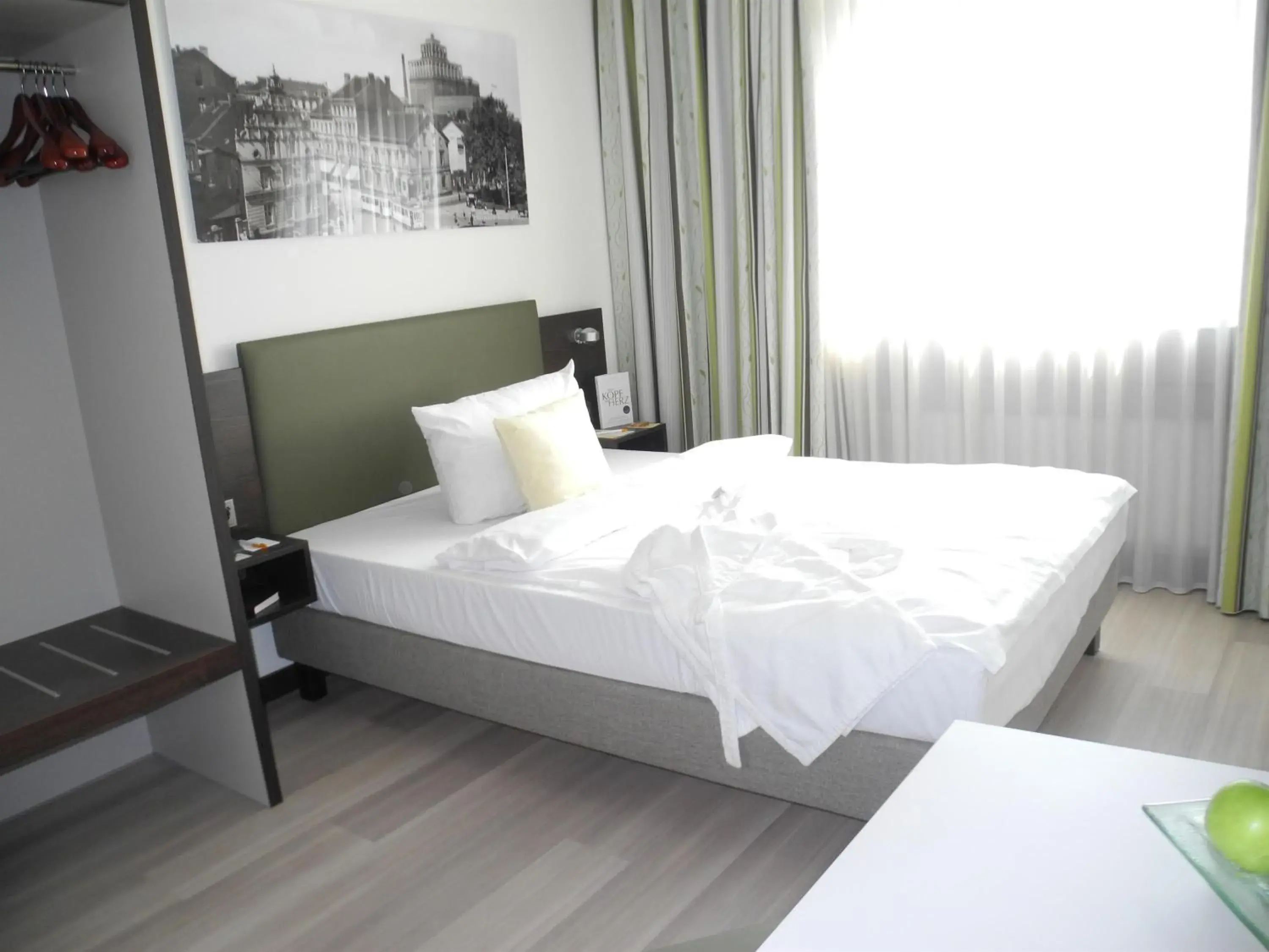 Photo of the whole room, Bed in Ringhotel Drees