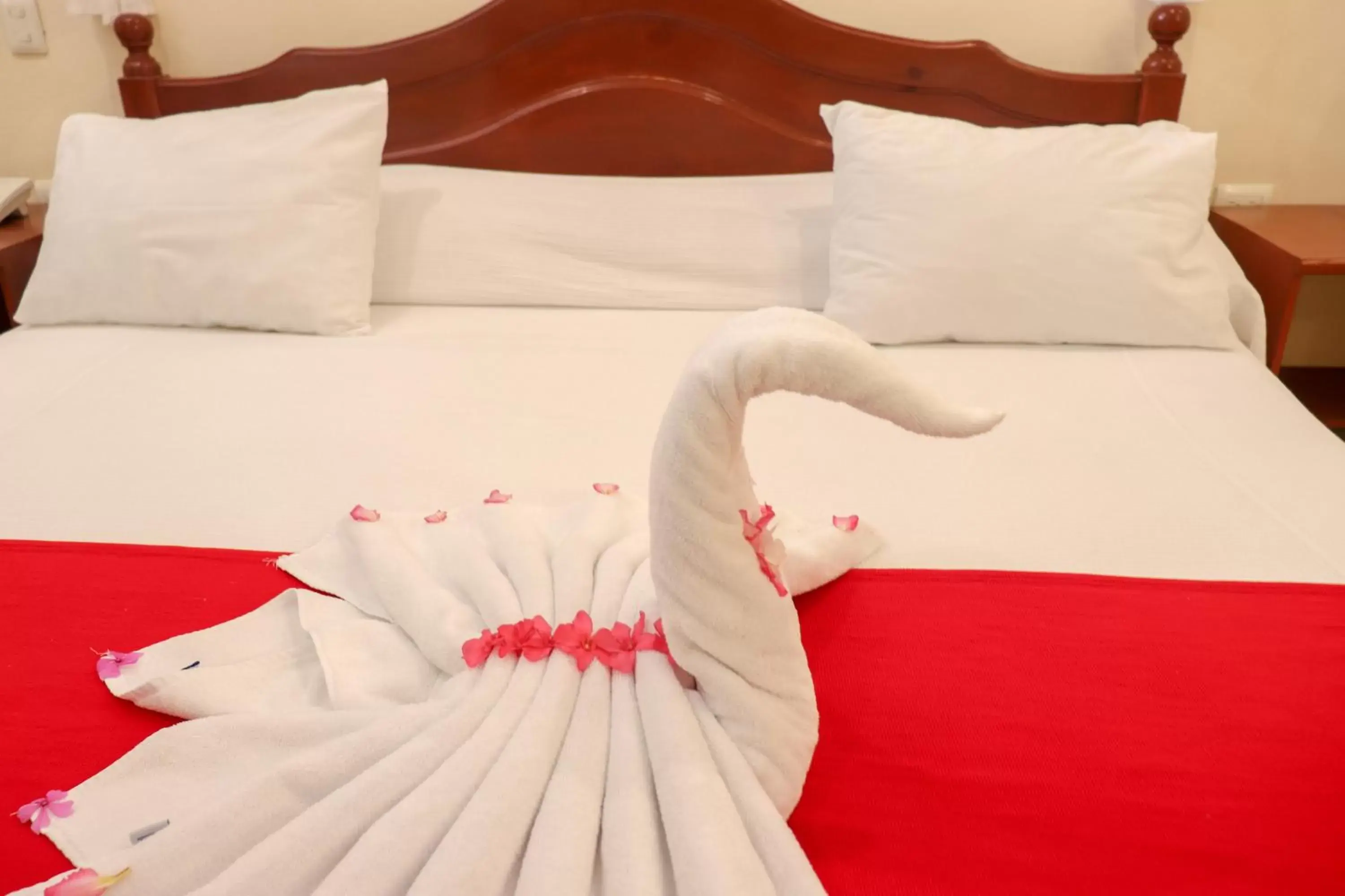 Bed in Villas Coco Resort - All Suites Bed in Villas Coco Resort - All Suites