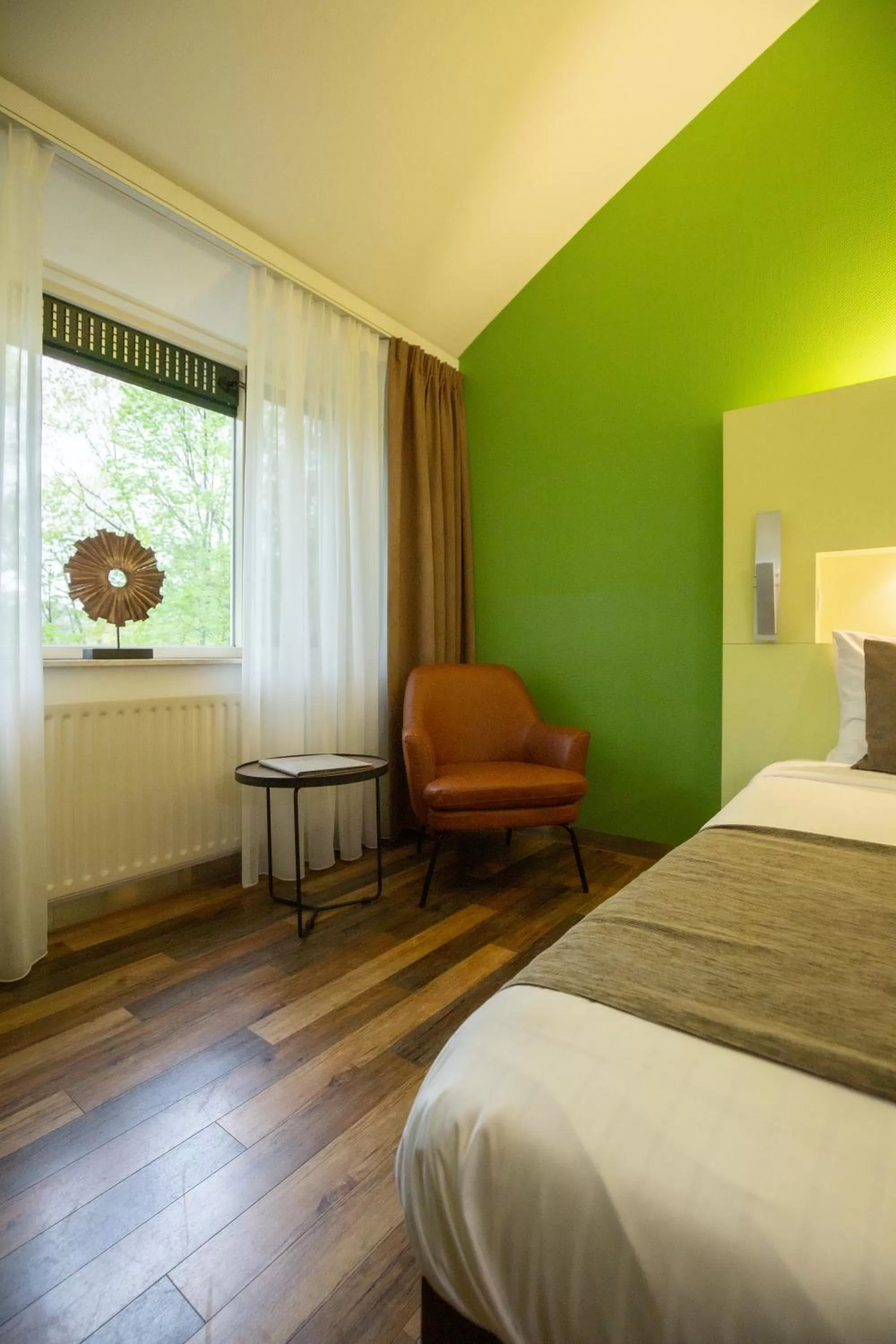 Seating area, Bed in 50|50 Hotel Belmont