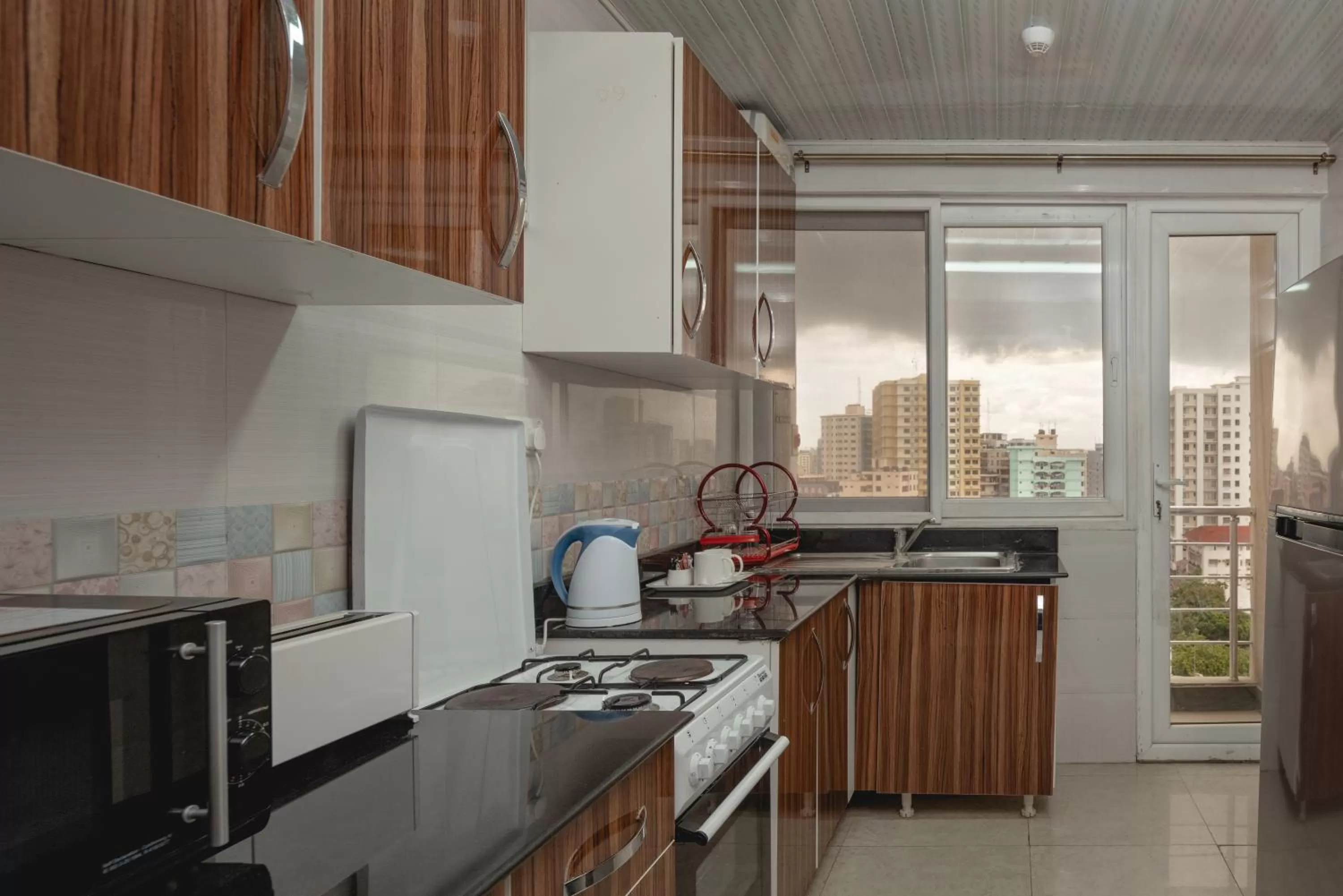 Kitchen or kitchenette in Golden Tulip Dar Es Salaam City Center Hotel