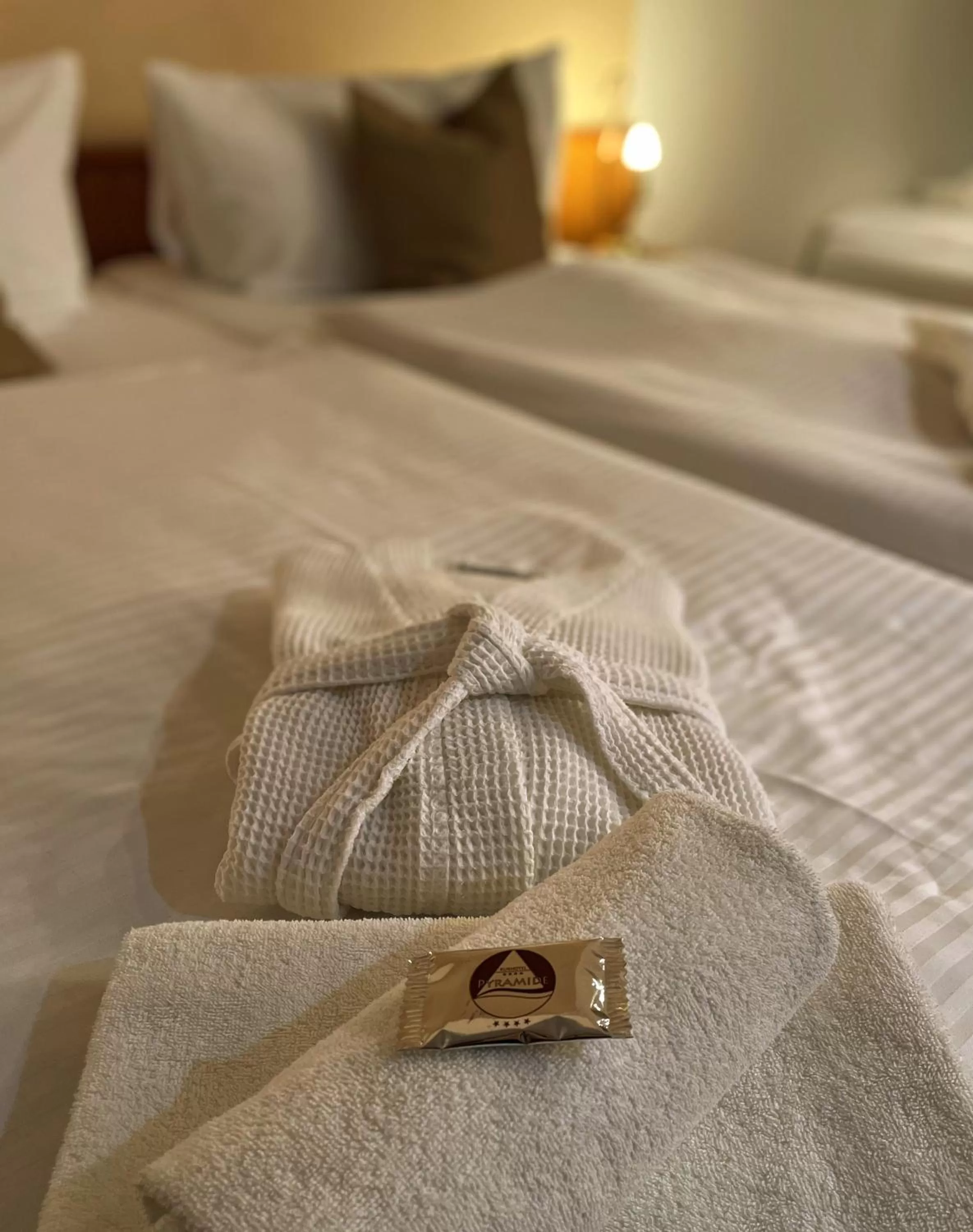 towels, Bed in Lázeňský hotel Pyramida