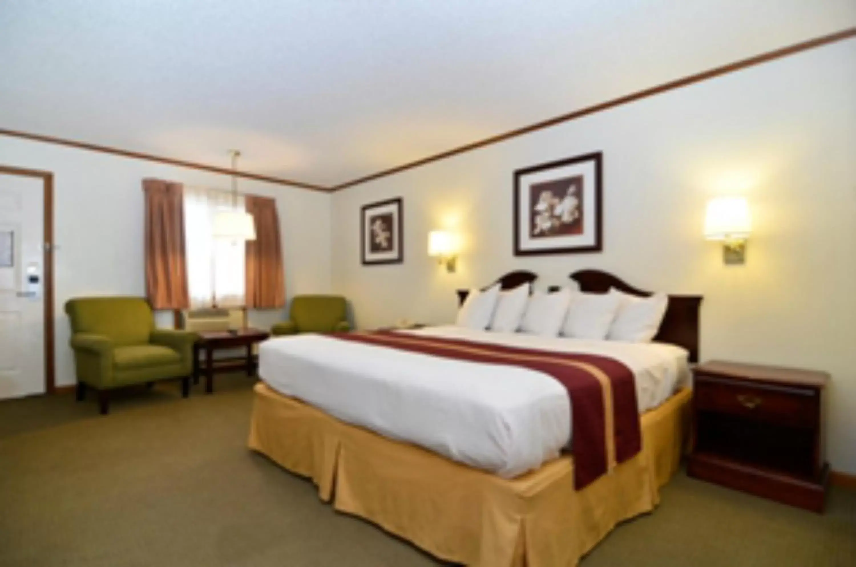 Bed in SureStay Hotel by Best Western Cameron