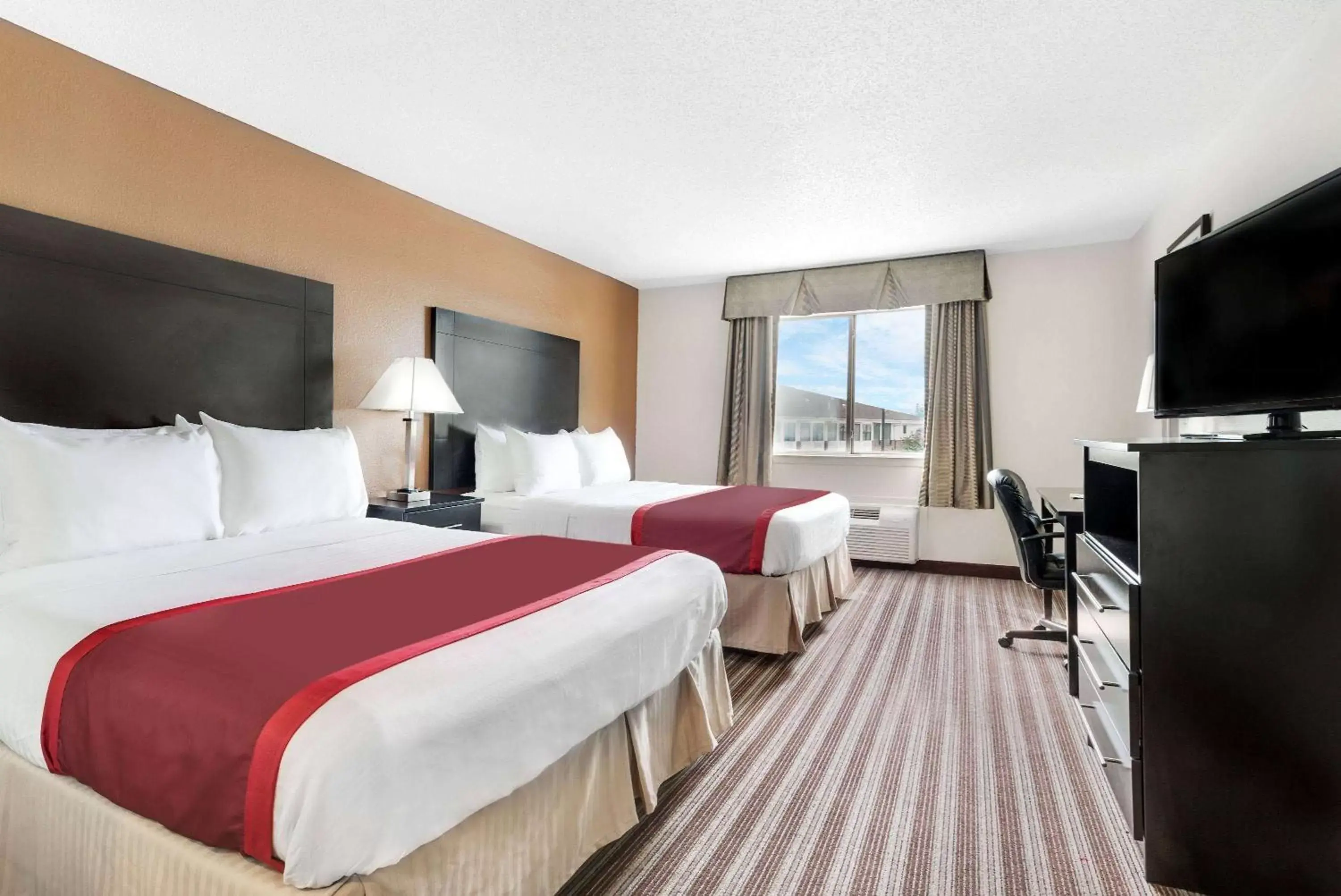 Photo of the whole room in Days Inn & Suites by Wyndham Dallas