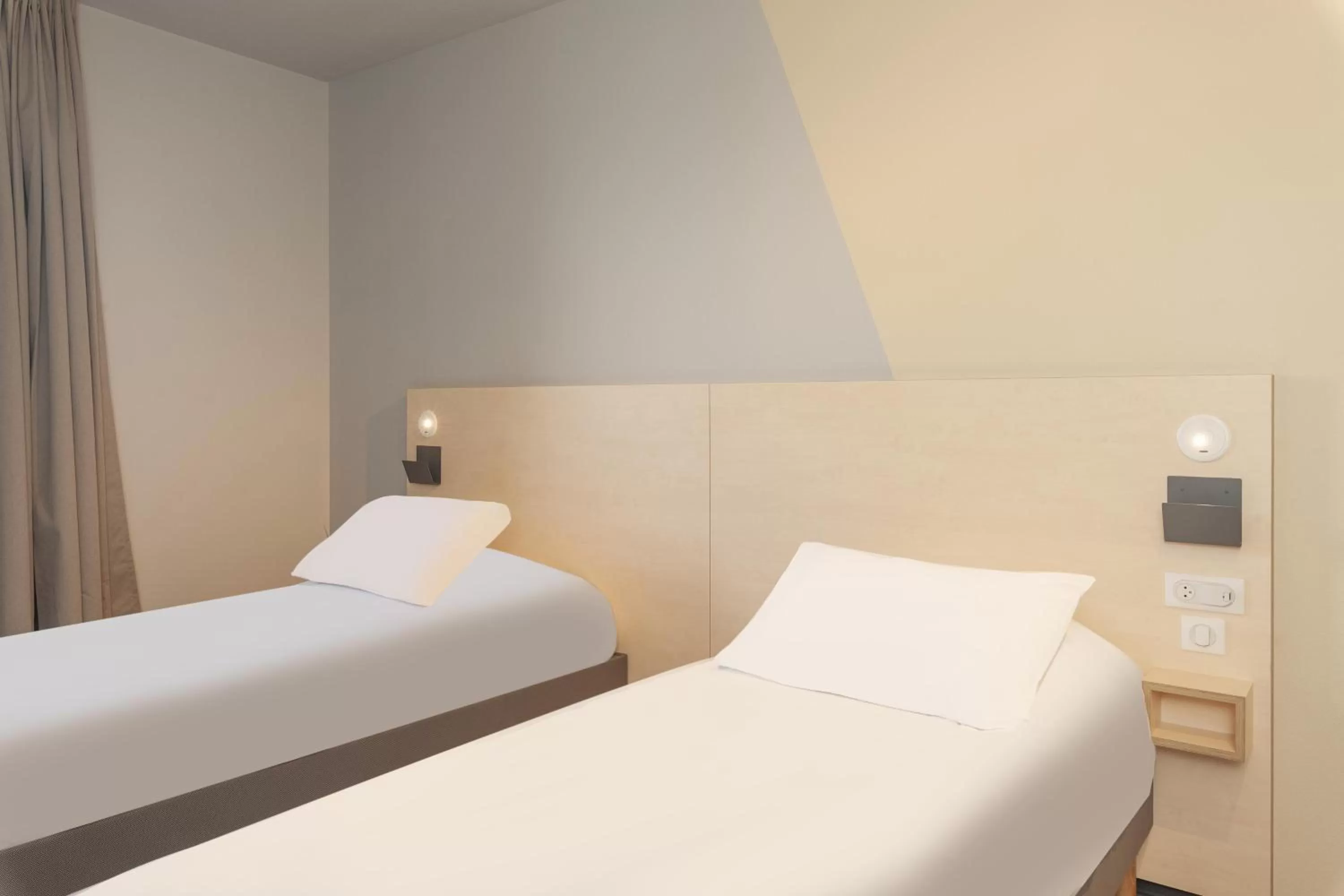 Bed in Ibis Budget Mont De Marsan