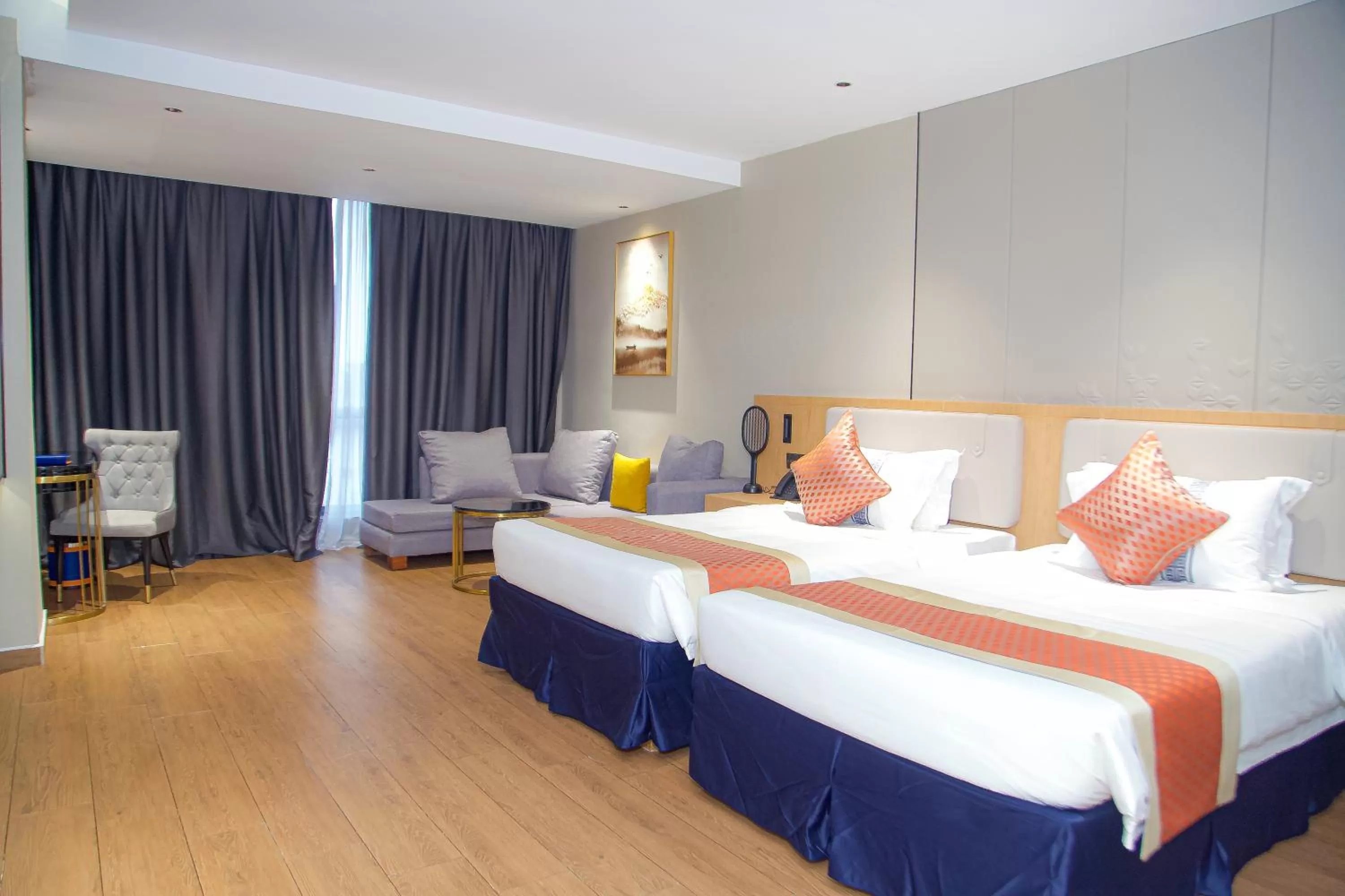 Photo of the whole room in Hôtel FAMILLE MONDIALE