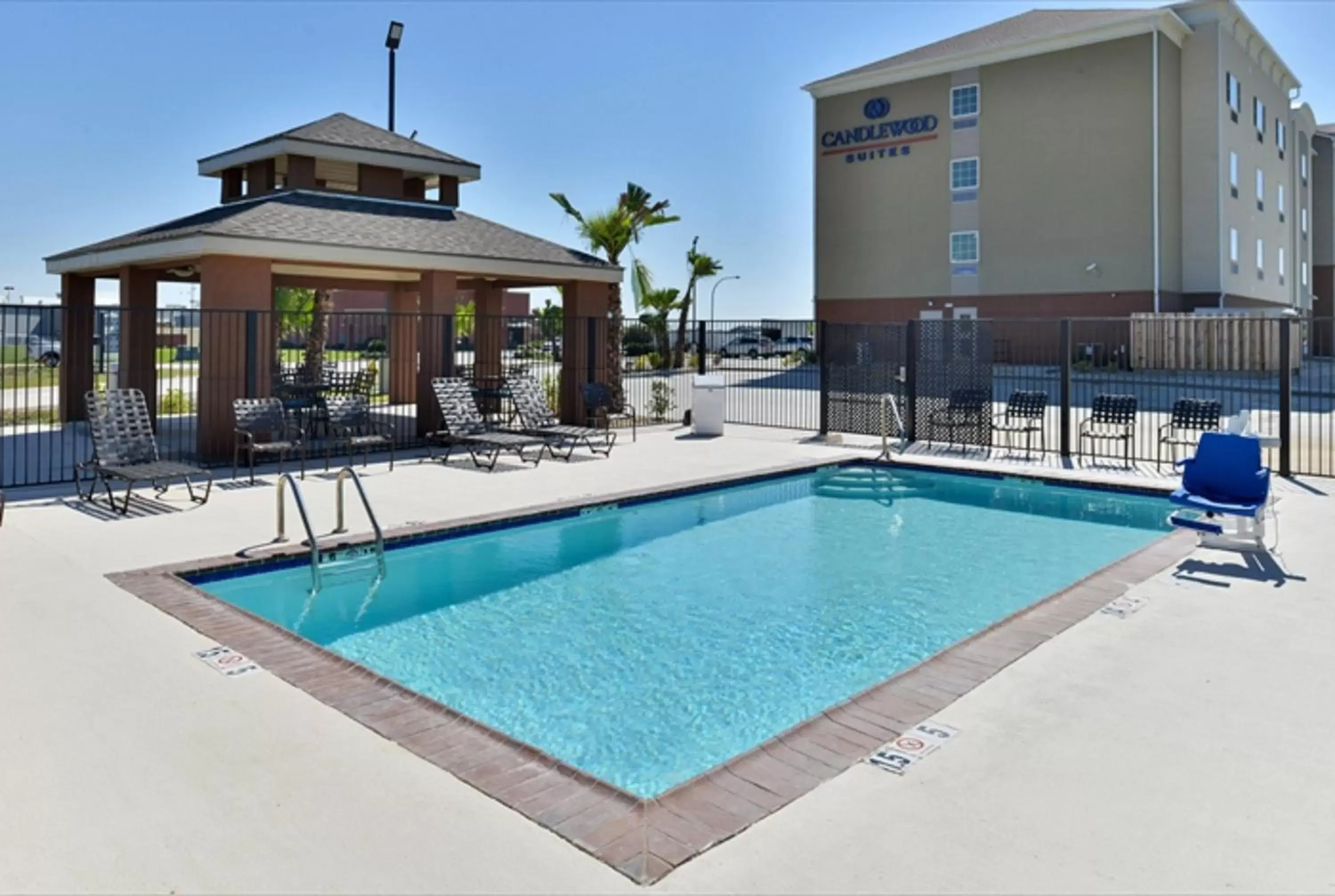 Property building, Swimming Pool in Candlewood Suites Houma, an IHG Hotel