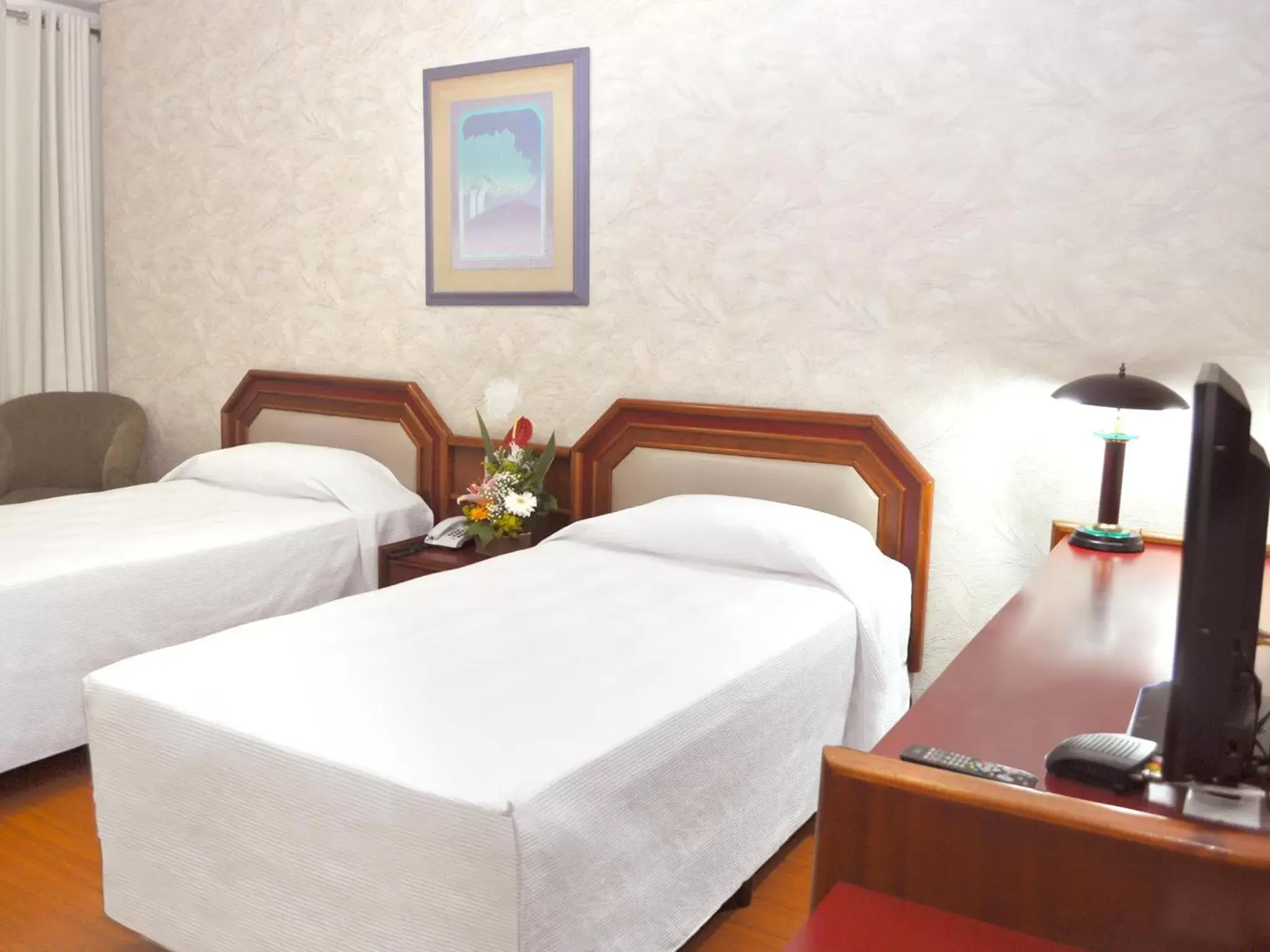 Bed in Caravelle Palace Hotel