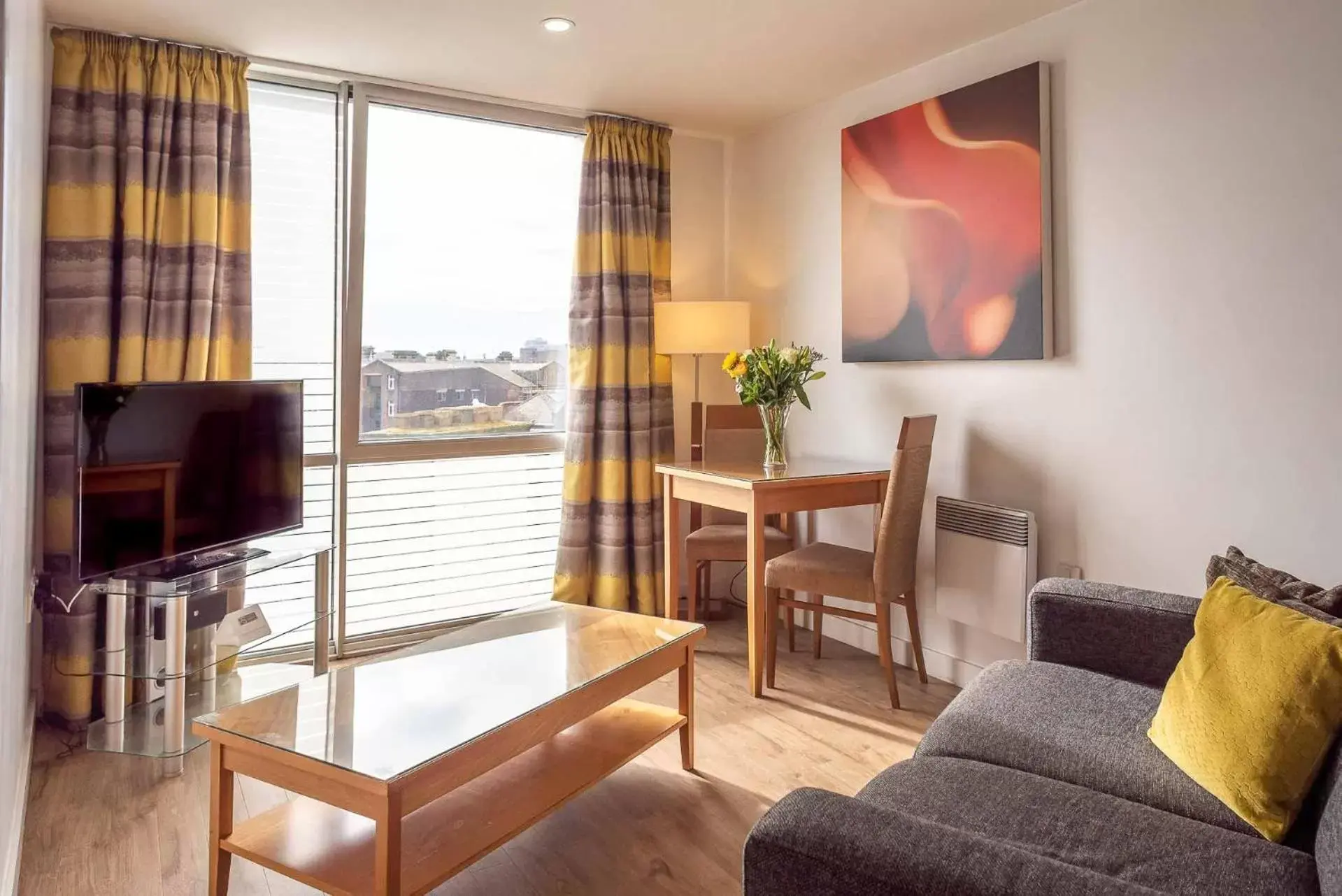 Living room, TV/Entertainment Center in PREMIER SUITES Liverpool