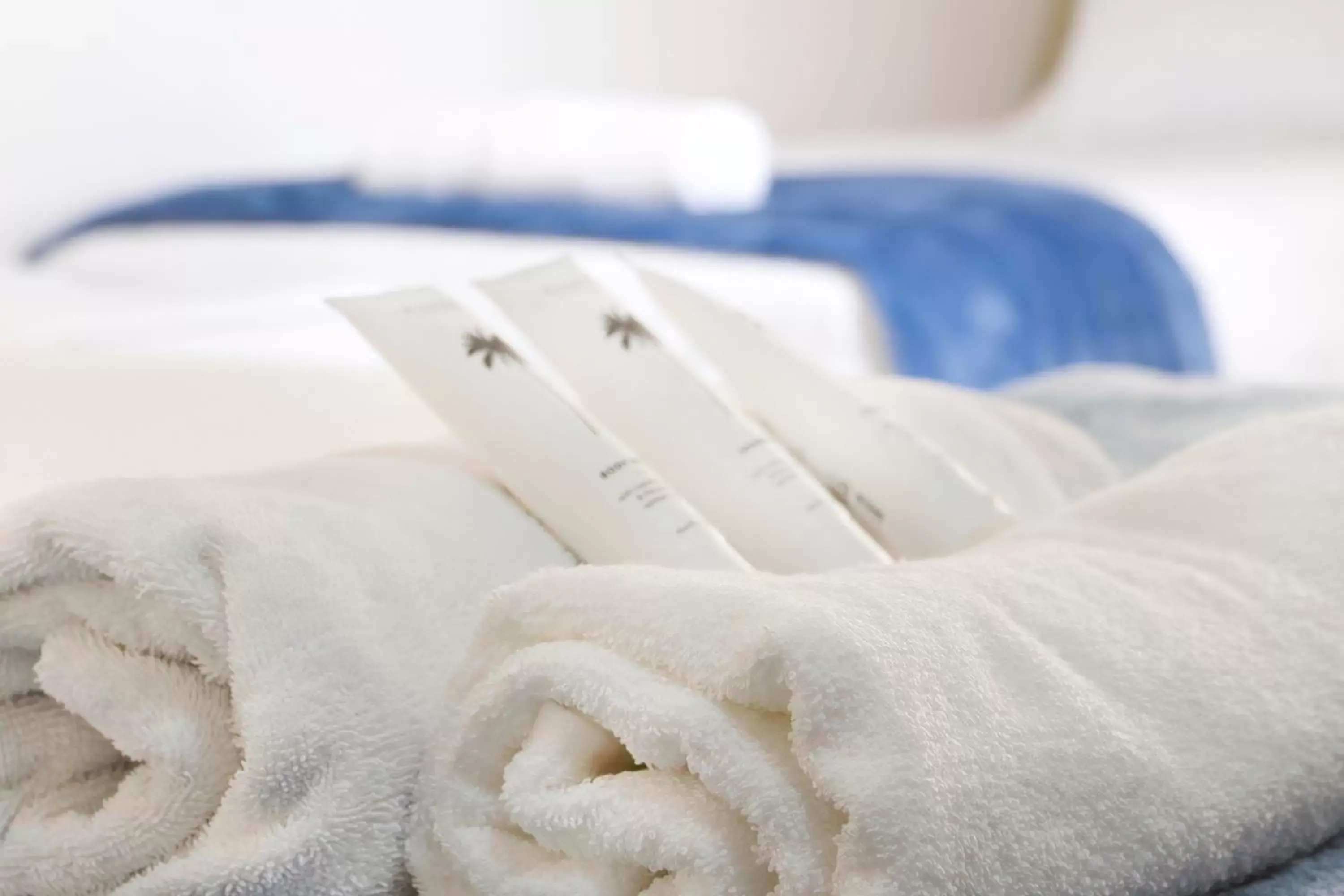 towels, Bed in Hotel Tropiq