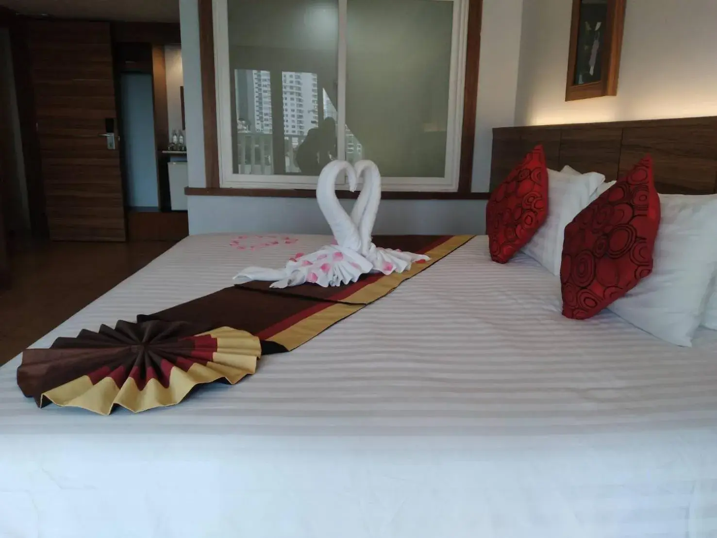 Bed in Saisawan Beach Resort