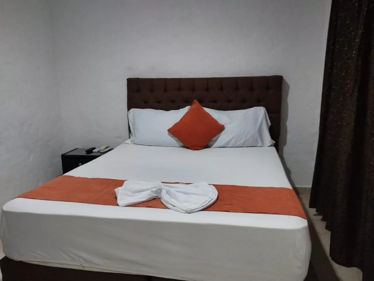 Bed in Blue Star Hotel