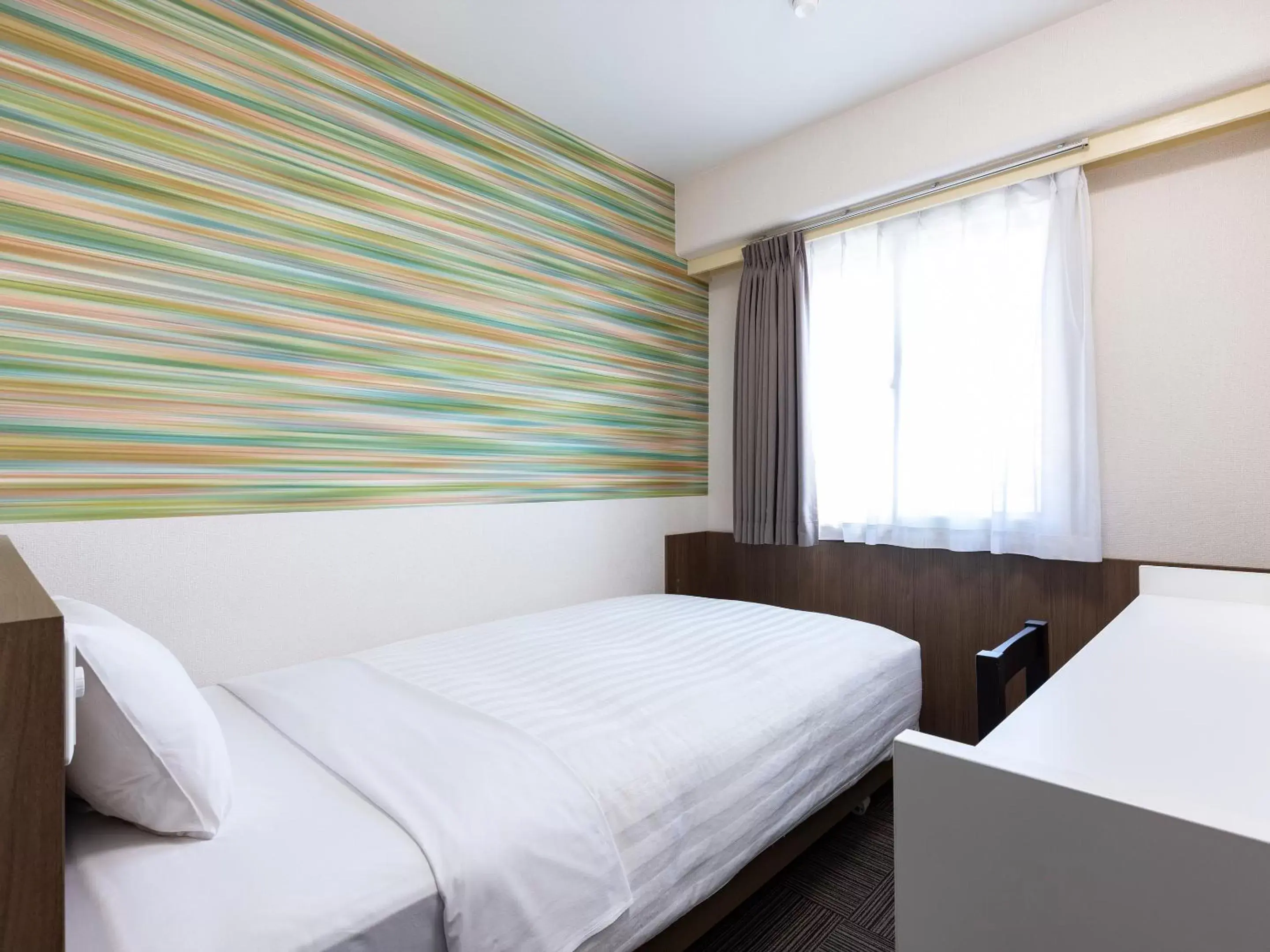 Bed in KOKO STAY Shimonoseki - formerly Hotel Wing International Shimonoseki Bed in KOKO STAY Shimonoseki - formerly Hotel Wing International Shimonoseki