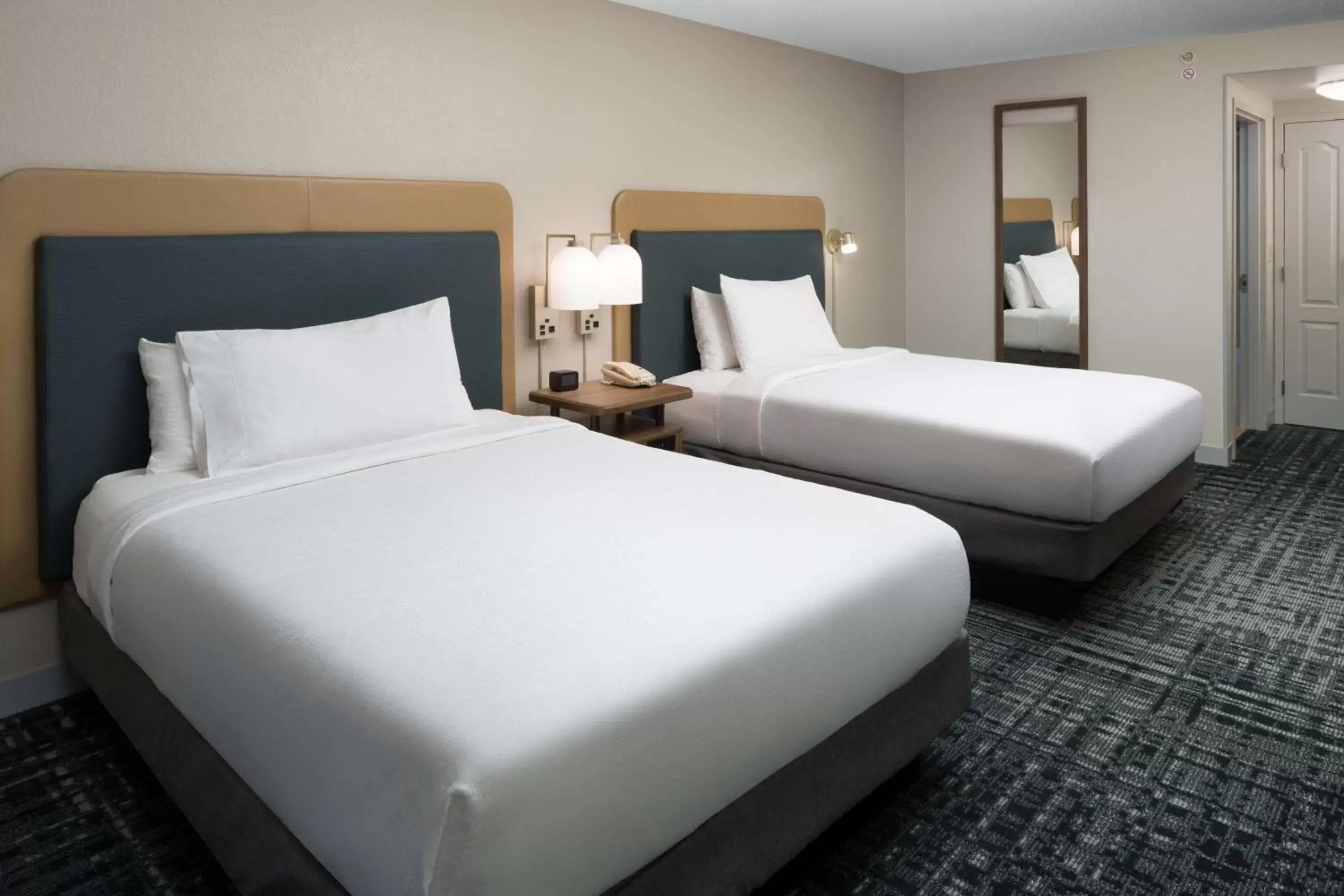 Bed in Homewood Suites by Hilton Newburgh-Stewart Airport