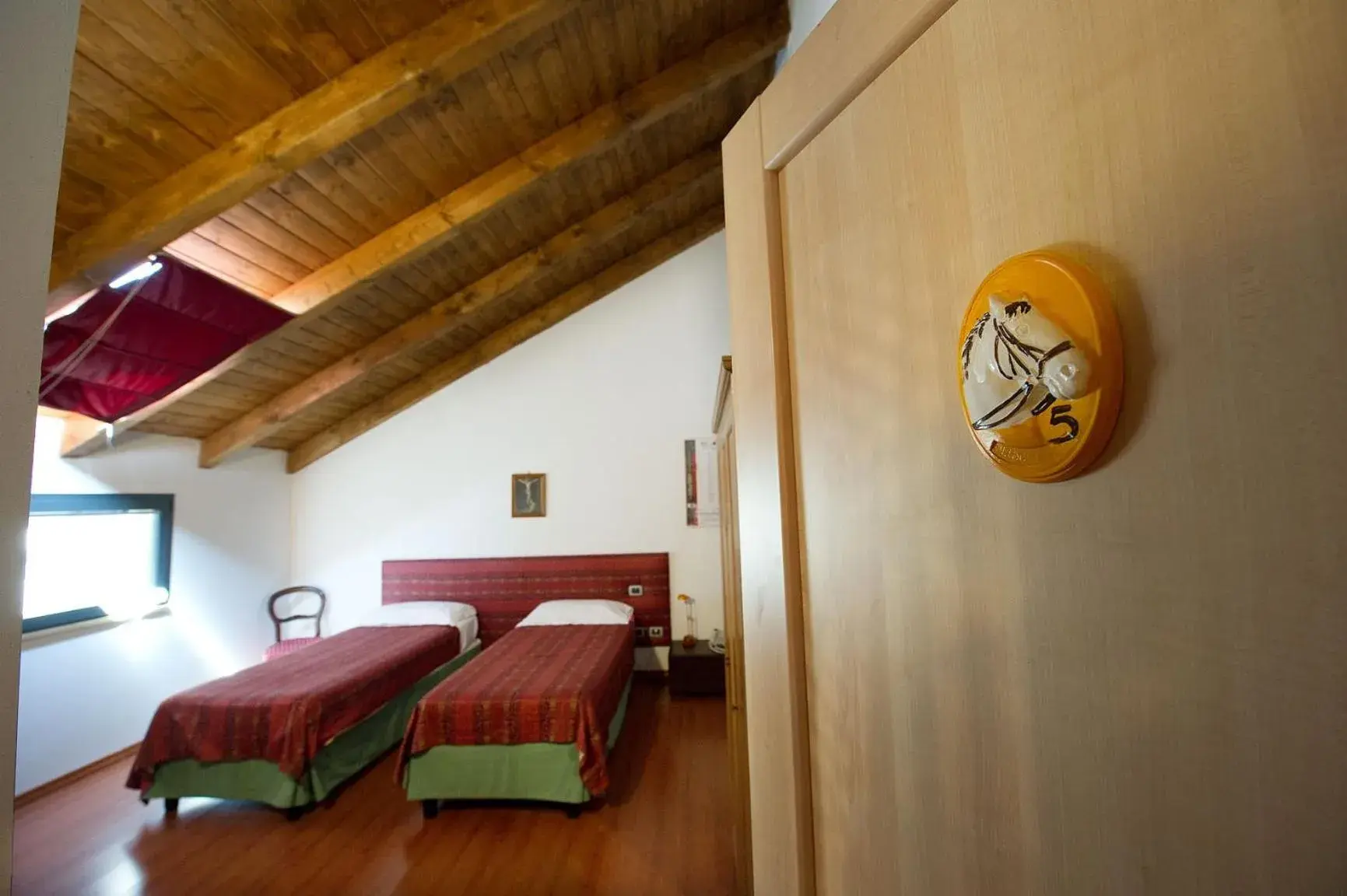 Photo of the whole room, Bed in Albergo Cavallino