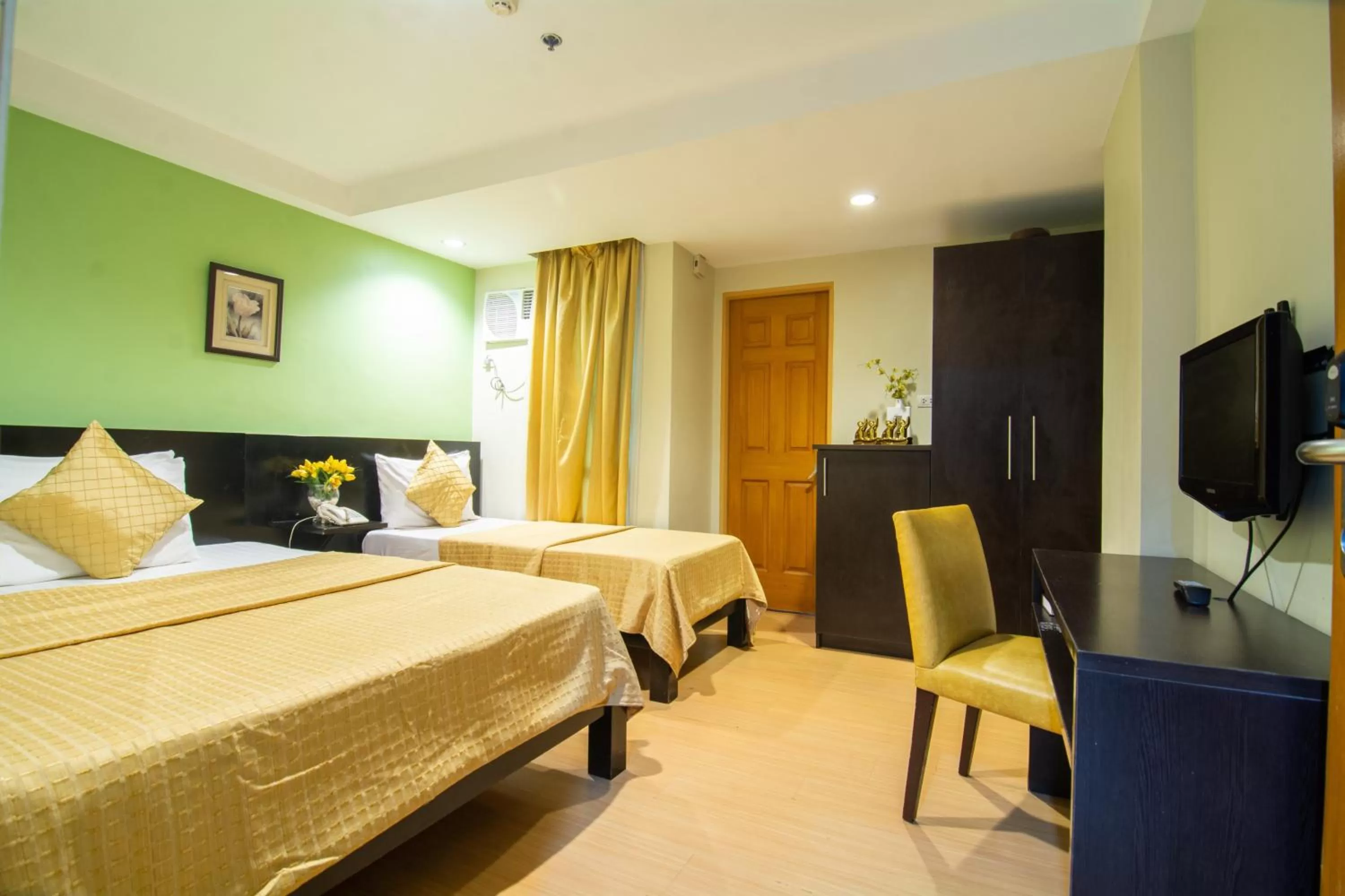 Bed in Festive Hotel Makati