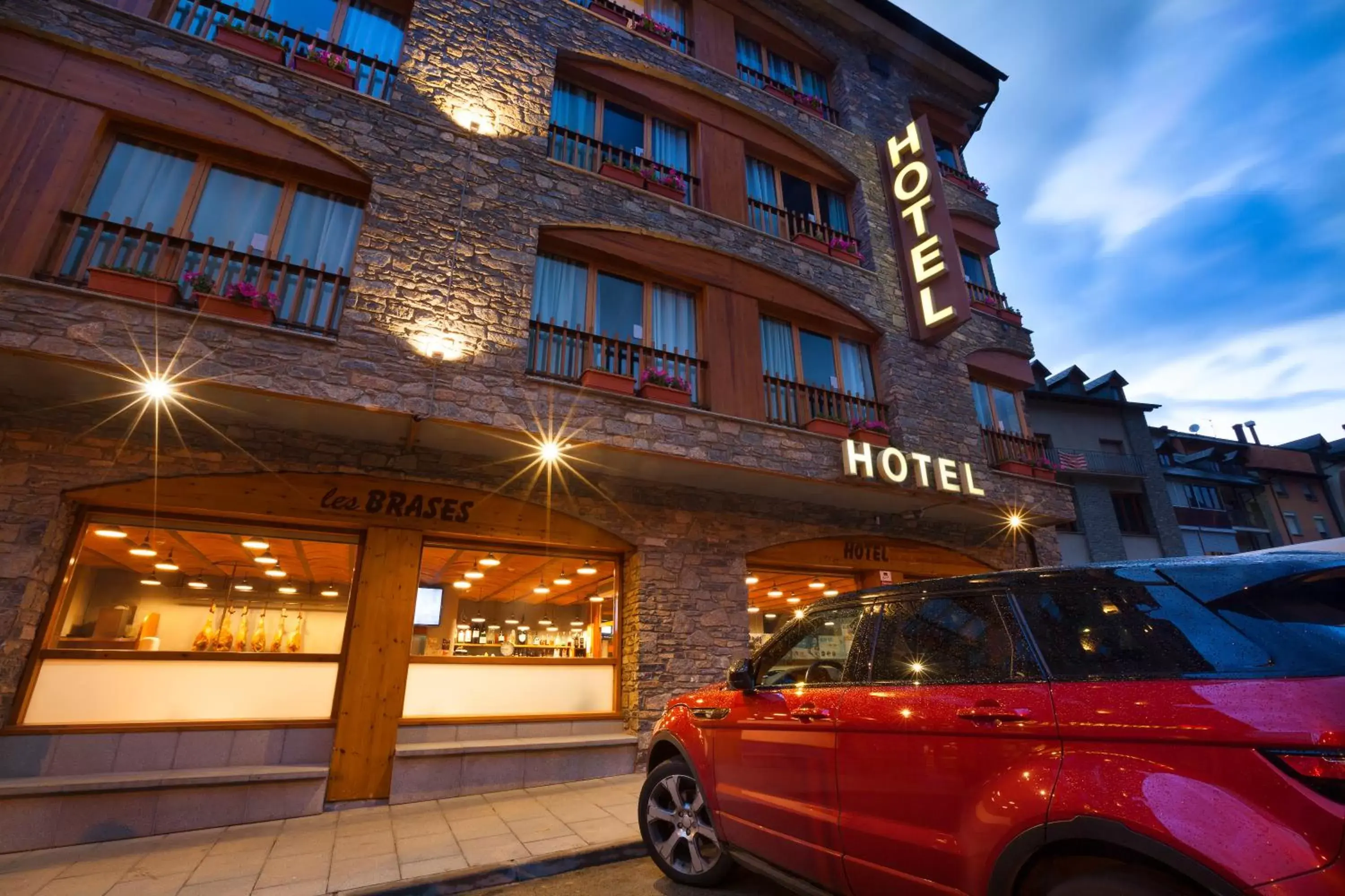 Property building in Hotel Restaurant Les Brases Property building in Hotel Restaurant Les Brases